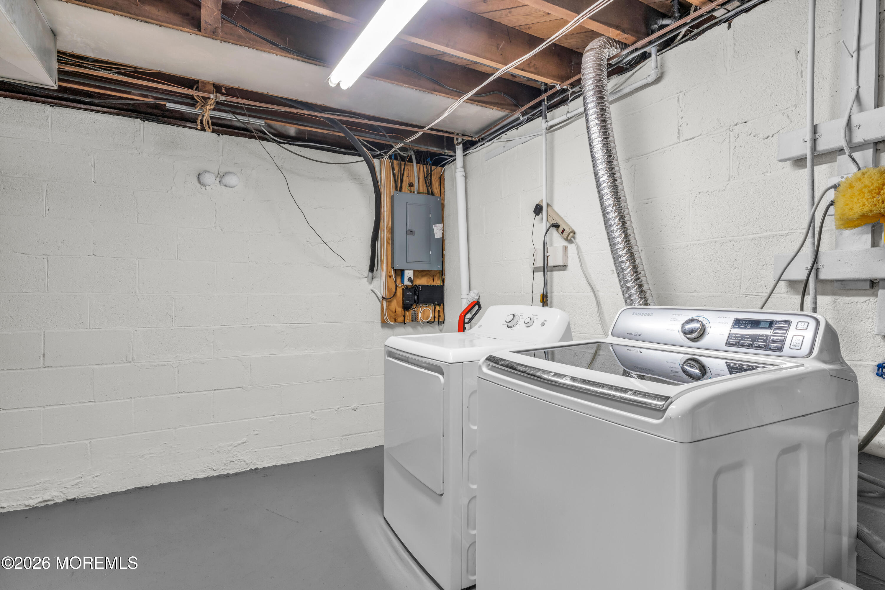 75 Carpenter Street Red Bank, NJ 07701 - Photo 25 of 28 a utility room with dryer and washer