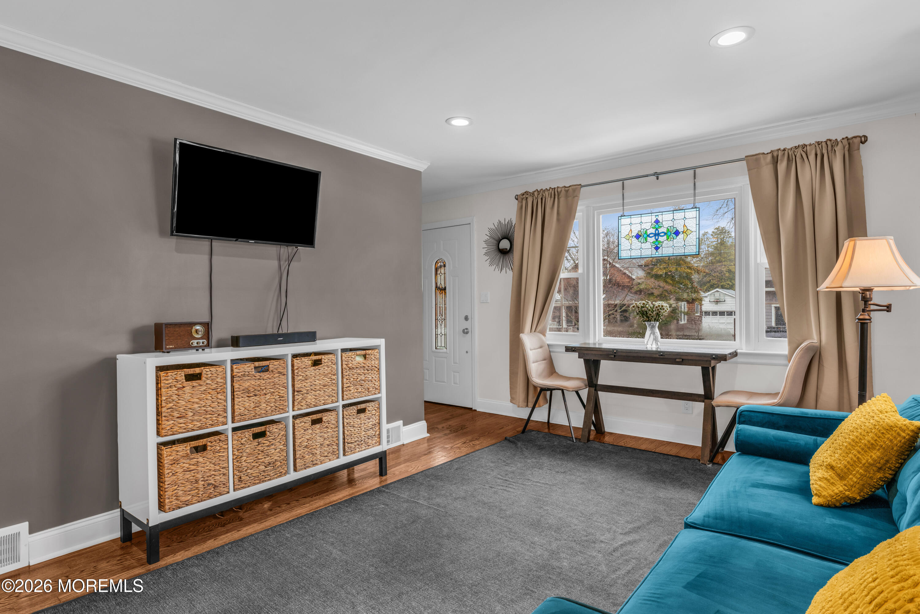 75 Carpenter Street Red Bank, NJ 07701 - Photo 5 of 28 a living room with furniture and a flat screen tv