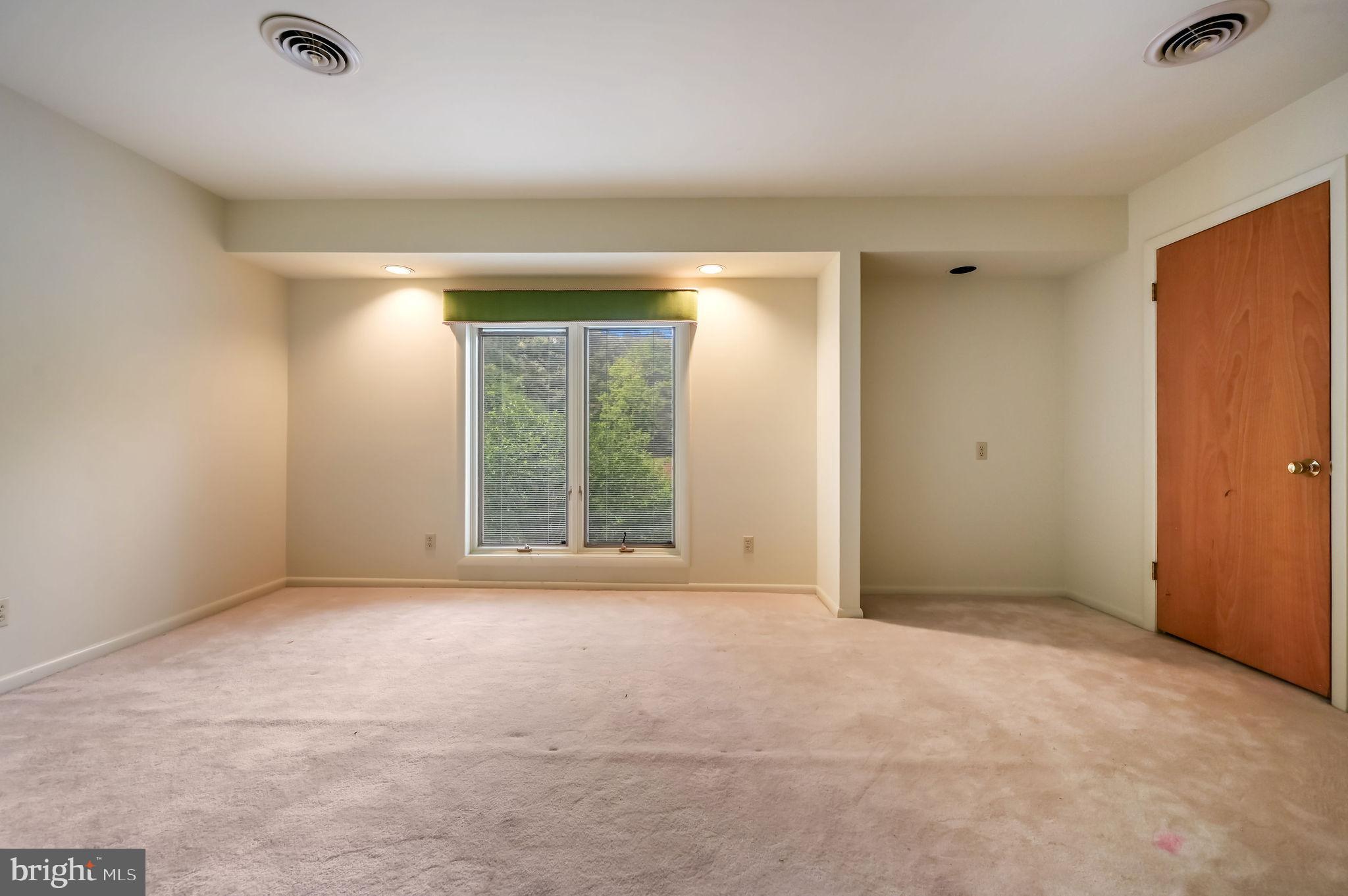 124 Meadowglen Drive Dover, DE 19901 - Photo 19 of 27 a view of an empty room with a window