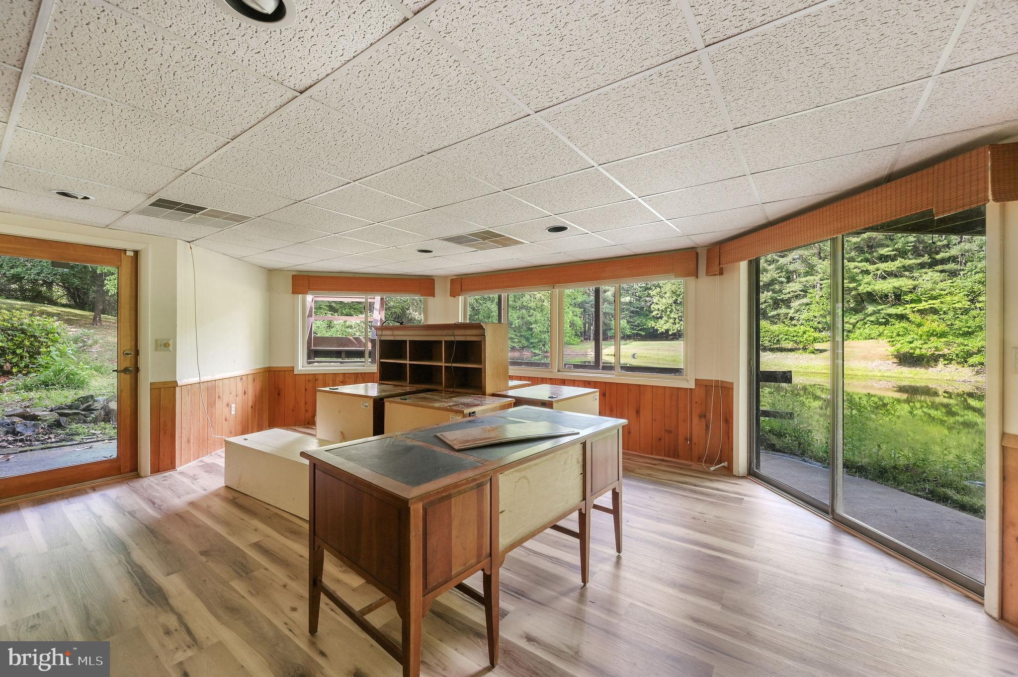 124 Meadowglen Drive Dover, DE 19901 - Photo 26 of 27 a view of a dining room with furniture window and wooden floor