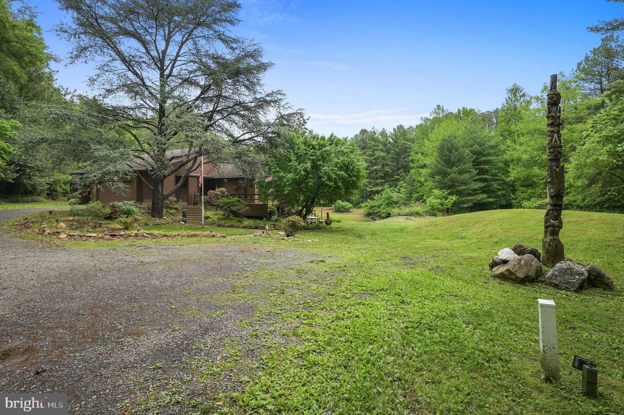 124 Meadowglen Drive Dover, DE 19901 - Photo 3 of 27 a backyard of a house with lots of green space