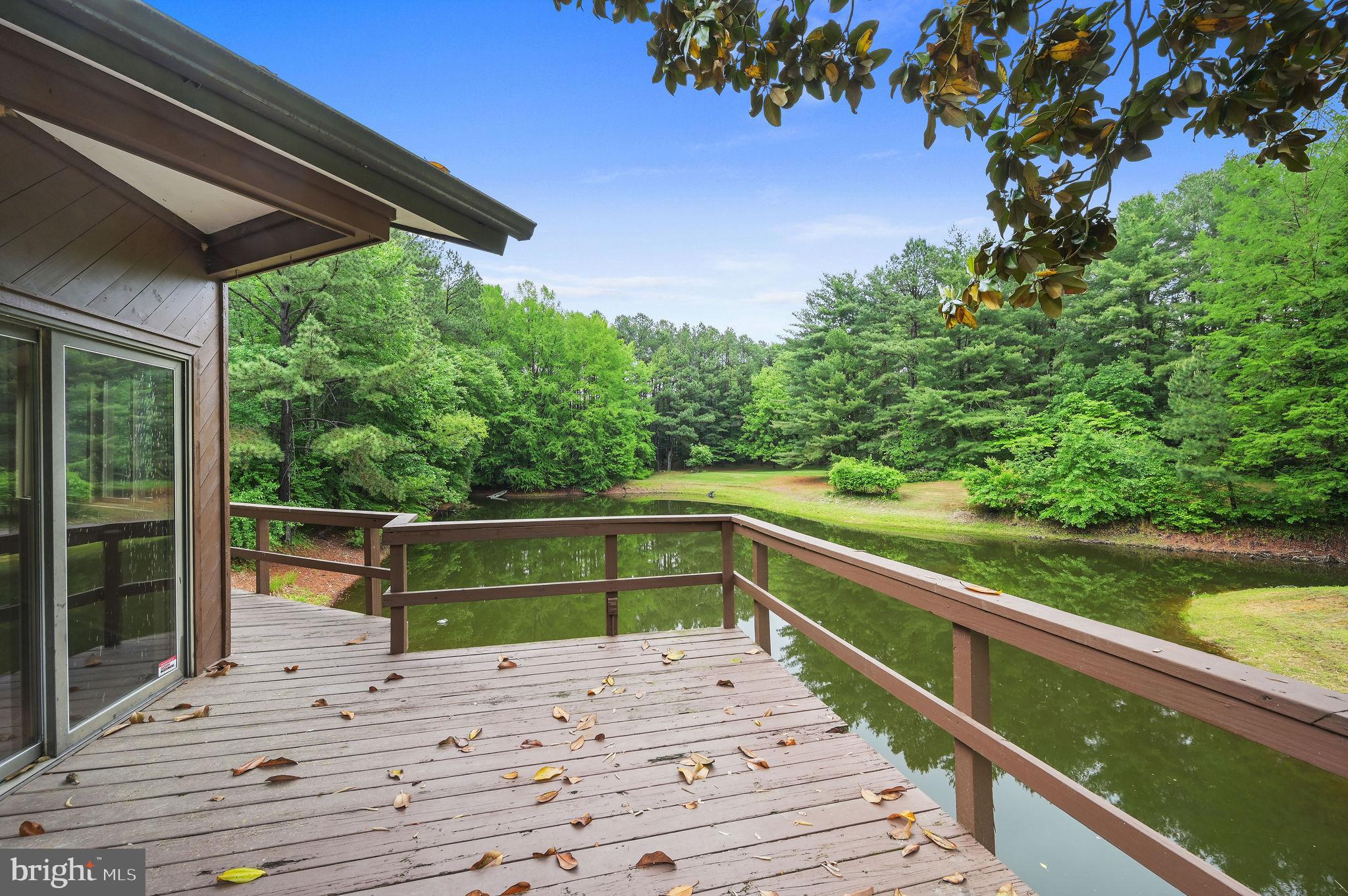 124 Meadowglen Drive Dover, DE 19901 - Photo 4 of 27 a view of balcony with wooden floor and outdoor space