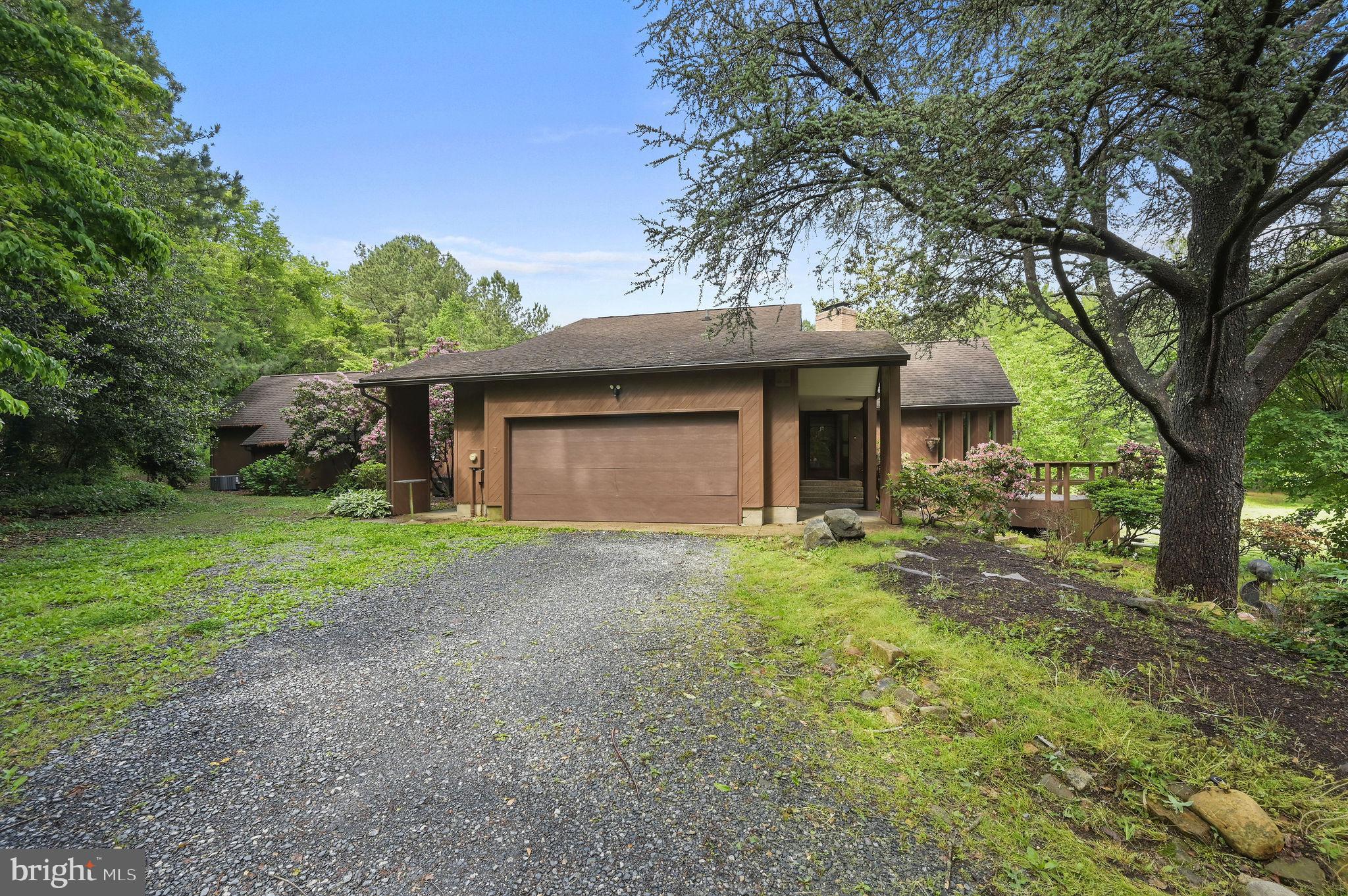 124 Meadowglen Drive Dover, DE 19901 - Photo 5 of 27 a view of a house with yard and a tree