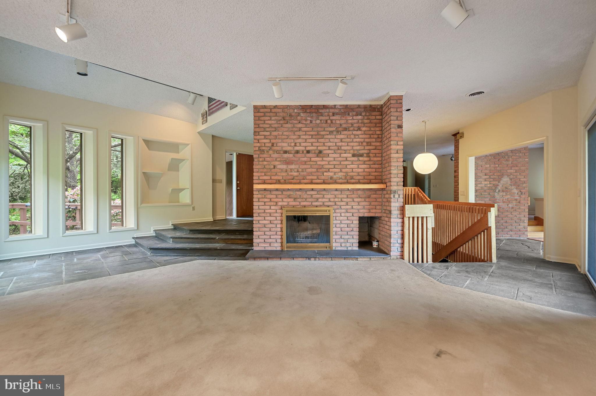 124 Meadowglen Drive Dover, DE 19901 - Photo 7 of 27 a view of a livingroom with a fireplace