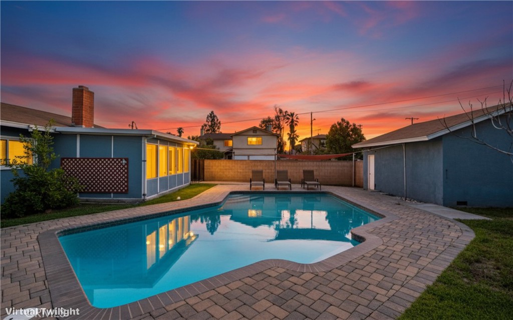 a view of a chairs and table on the wooden roof