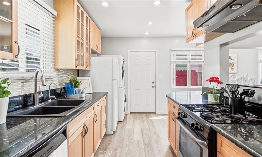 401 North Rennell Avenue San Dimas, CA 91773 - Photo 5 of 9 a kitchen with granite countertop a sink stove and refrigerator