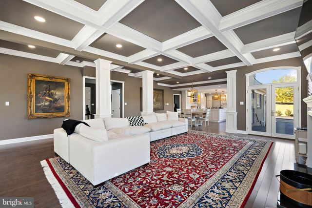 a kitchen with stainless steel appliances kitchen island granite countertop a sink and cabinets