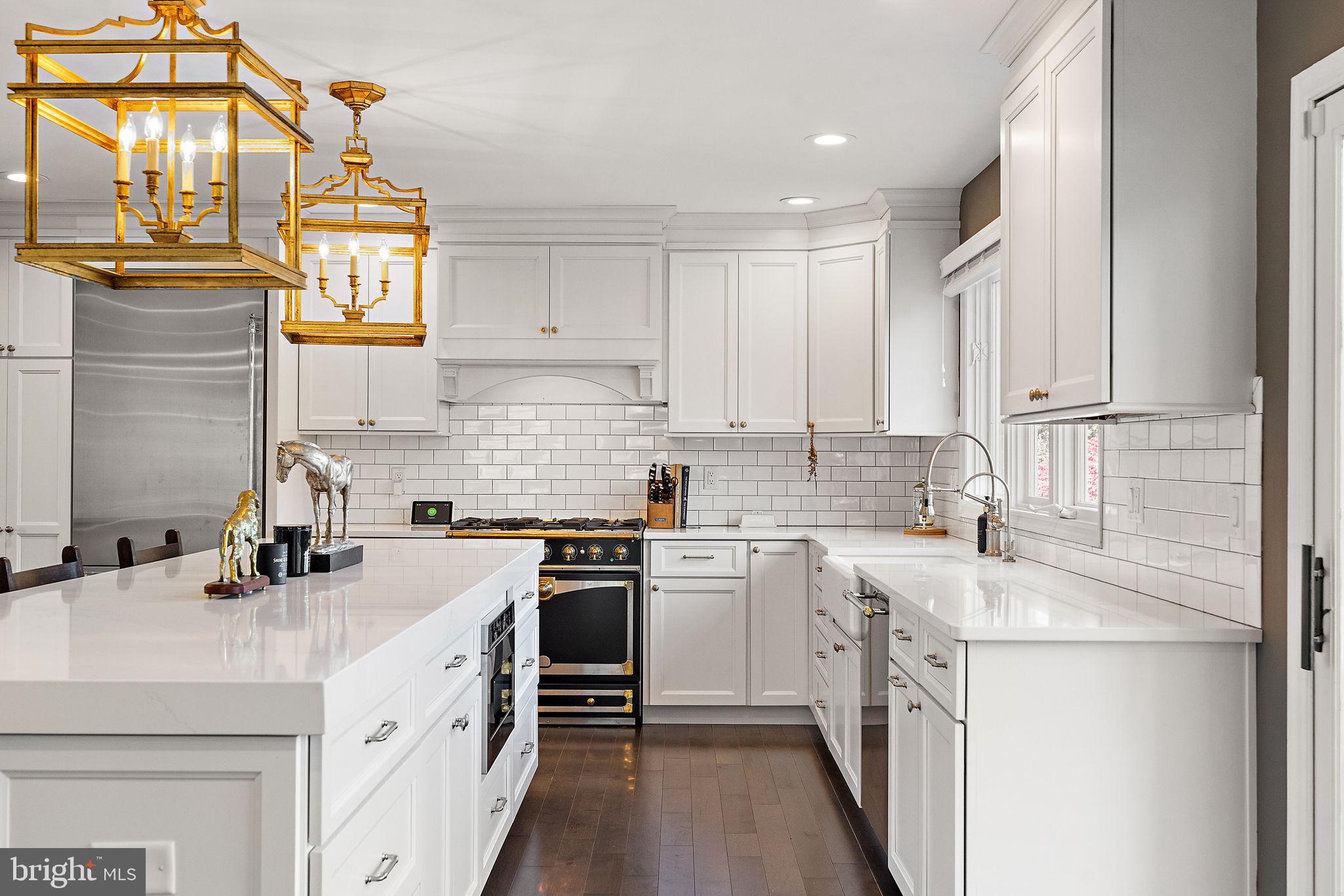 200 Dogwood Slope Road Wilmington, DE 19807 - Photo 17 of 80 a kitchen with a sink stove and cabinets