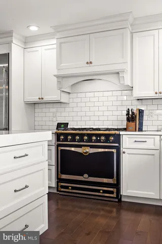 a view of a living room with furniture and a window