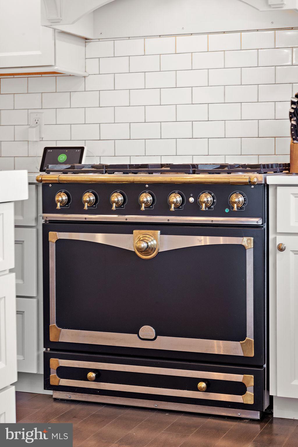 200 Dogwood Slope Road Wilmington, DE 19807 - Photo 24 of 80 a stove top oven sitting inside of a kitchen