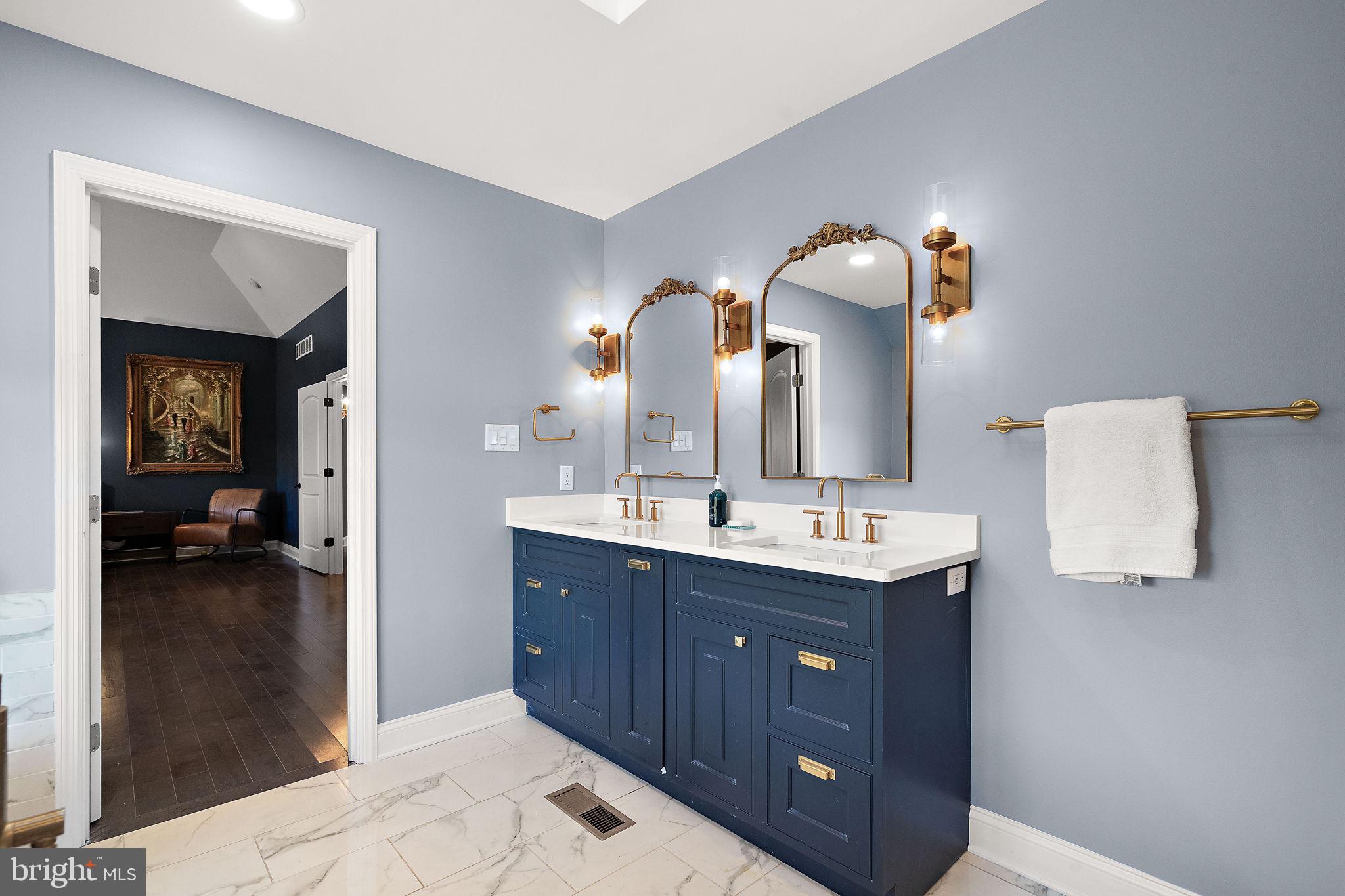 200 Dogwood Slope Road Wilmington, DE 19807 - Photo 43 of 80 a bathroom with a sink vanity and mirror