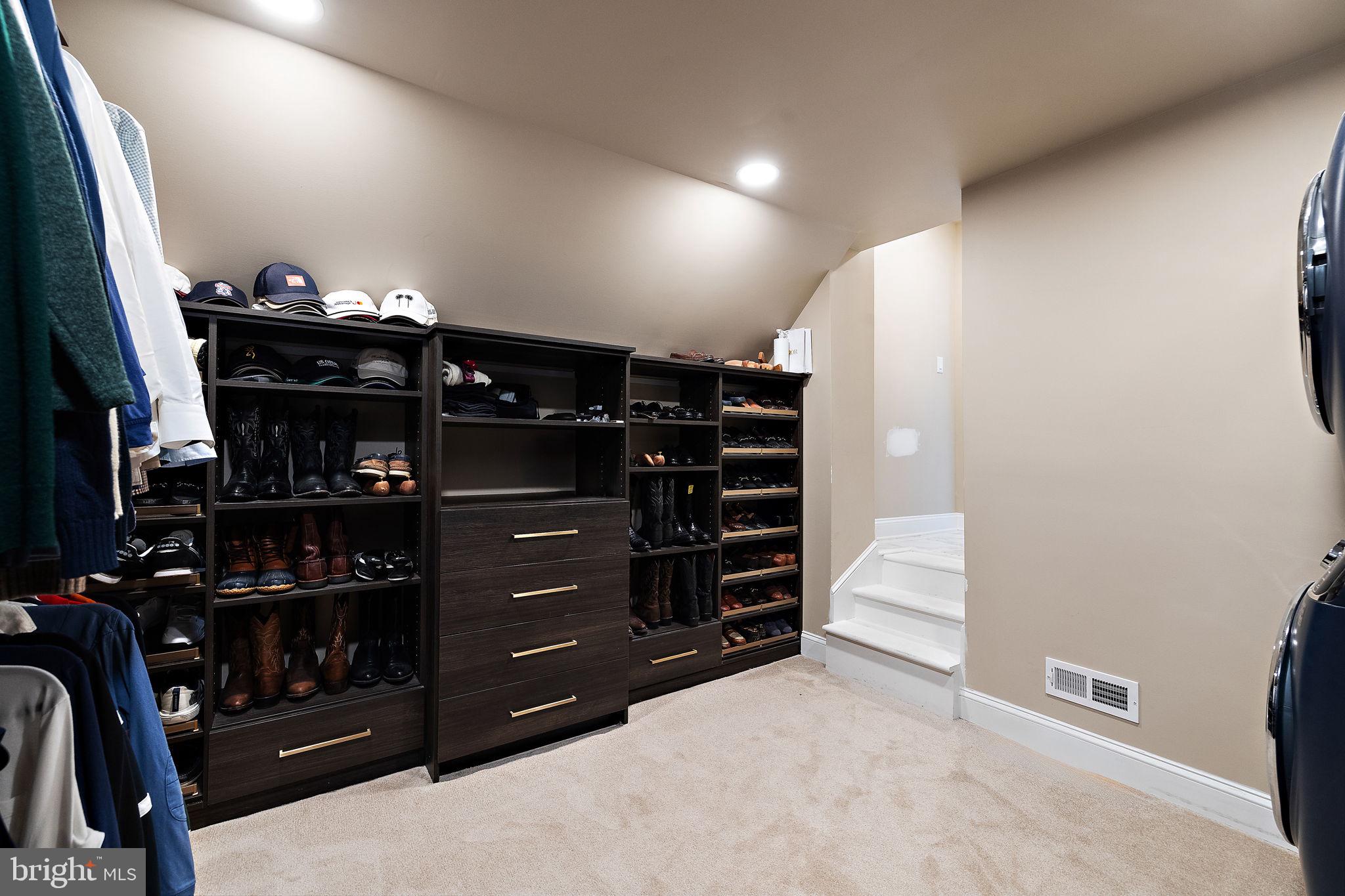 200 Dogwood Slope Road Wilmington, DE 19807 - Photo 48 of 80 a view of walk in closet with clothes and shoes
