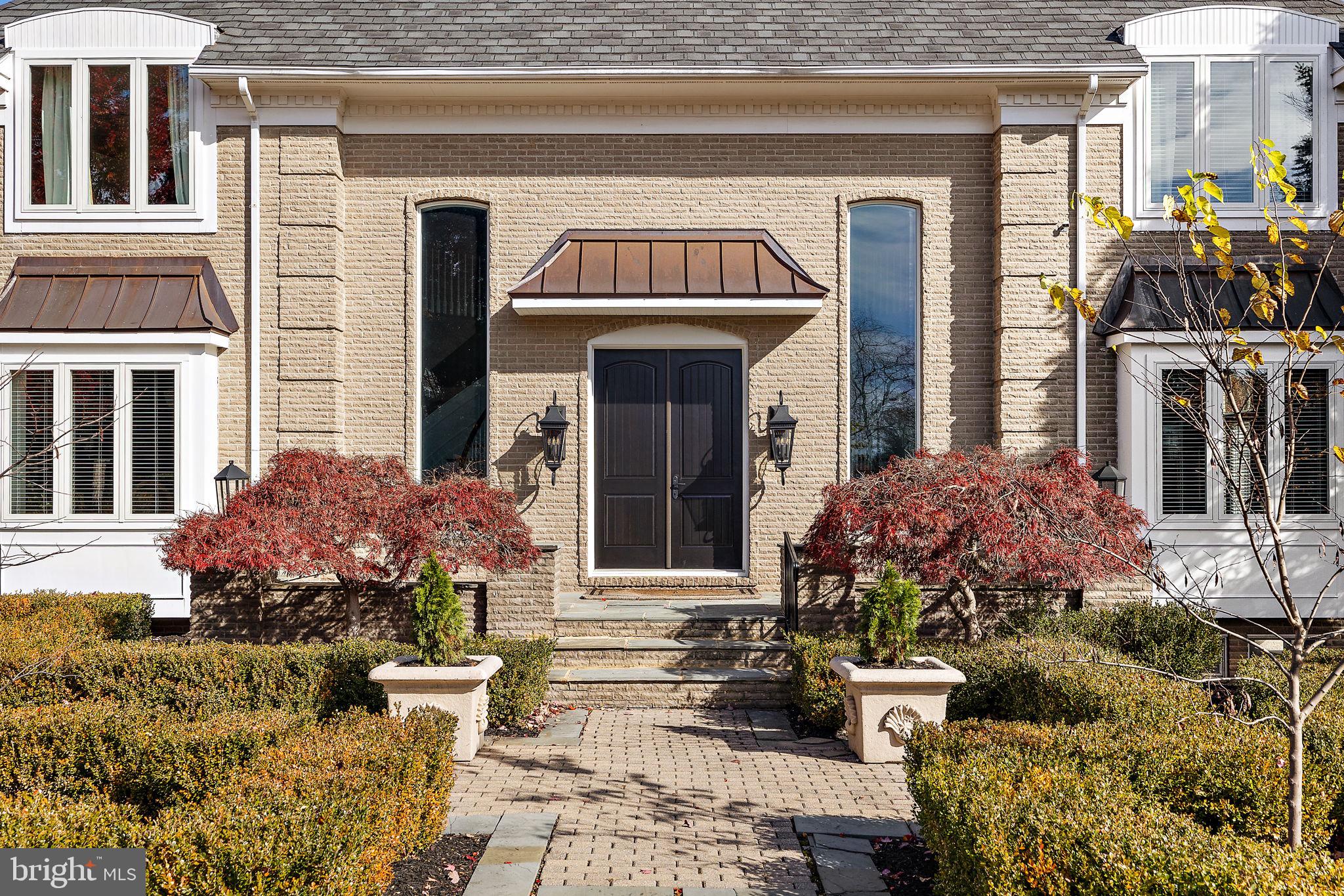 200 Dogwood Slope Road Wilmington, DE 19807 - Photo 5 of 80 a front view of a house with a garden