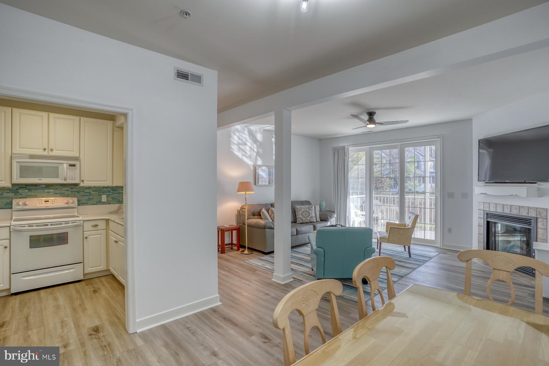 30619 Cedar Neck Road, Unit 1103 Ocean View, DE 19970 - Photo 4 of 58 Open floor plan with luxury vinyl plank flooring