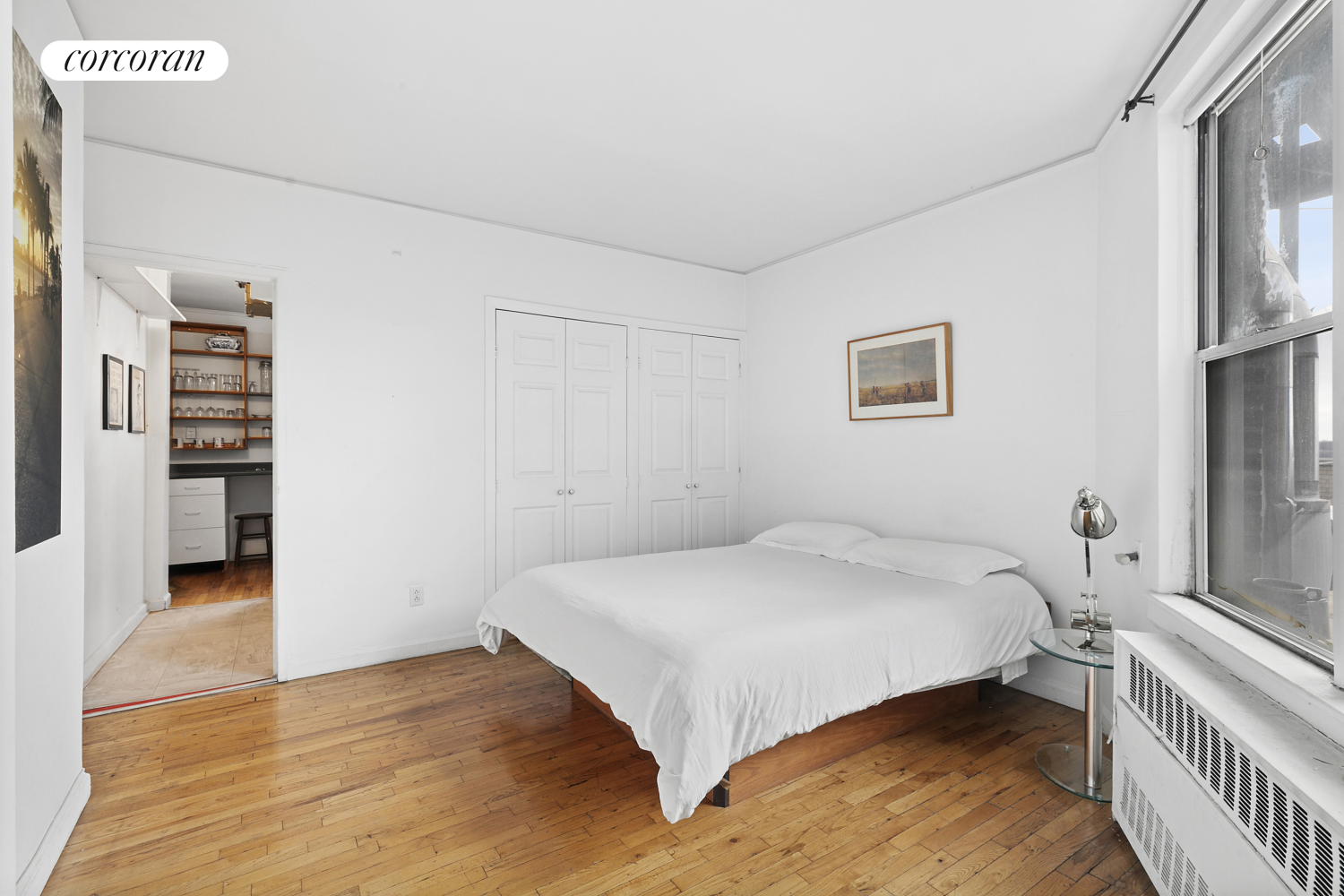 789 West End Avenue, Unit PH6 Manhattan, NY 10025 - Photo 7 of 19 a bedroom with a bed and a cabinets