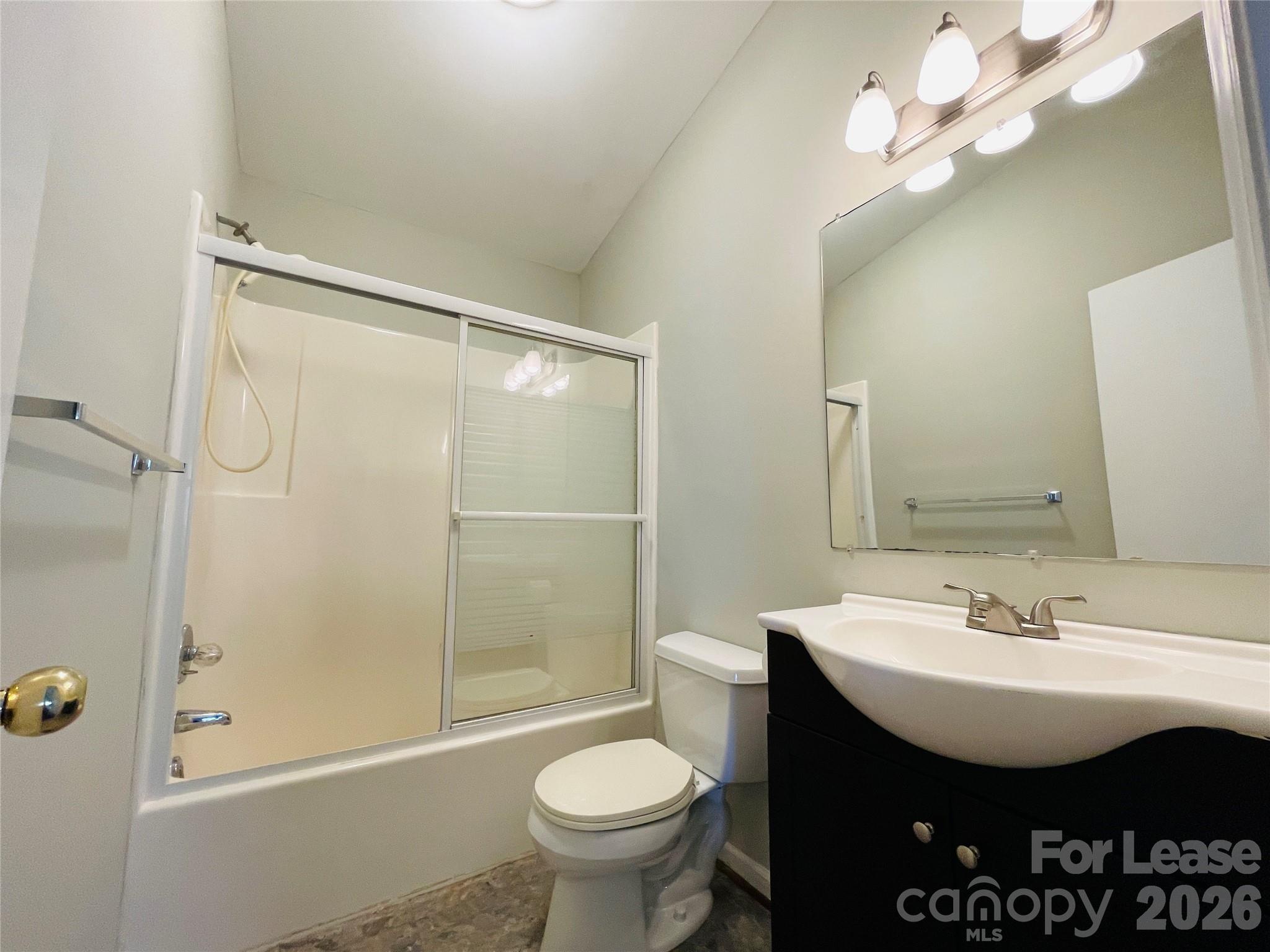 2499 Brookwood Road Lincolnton, NC 28092 - Photo 6 of 12 a bathroom with a sink toilet and shower