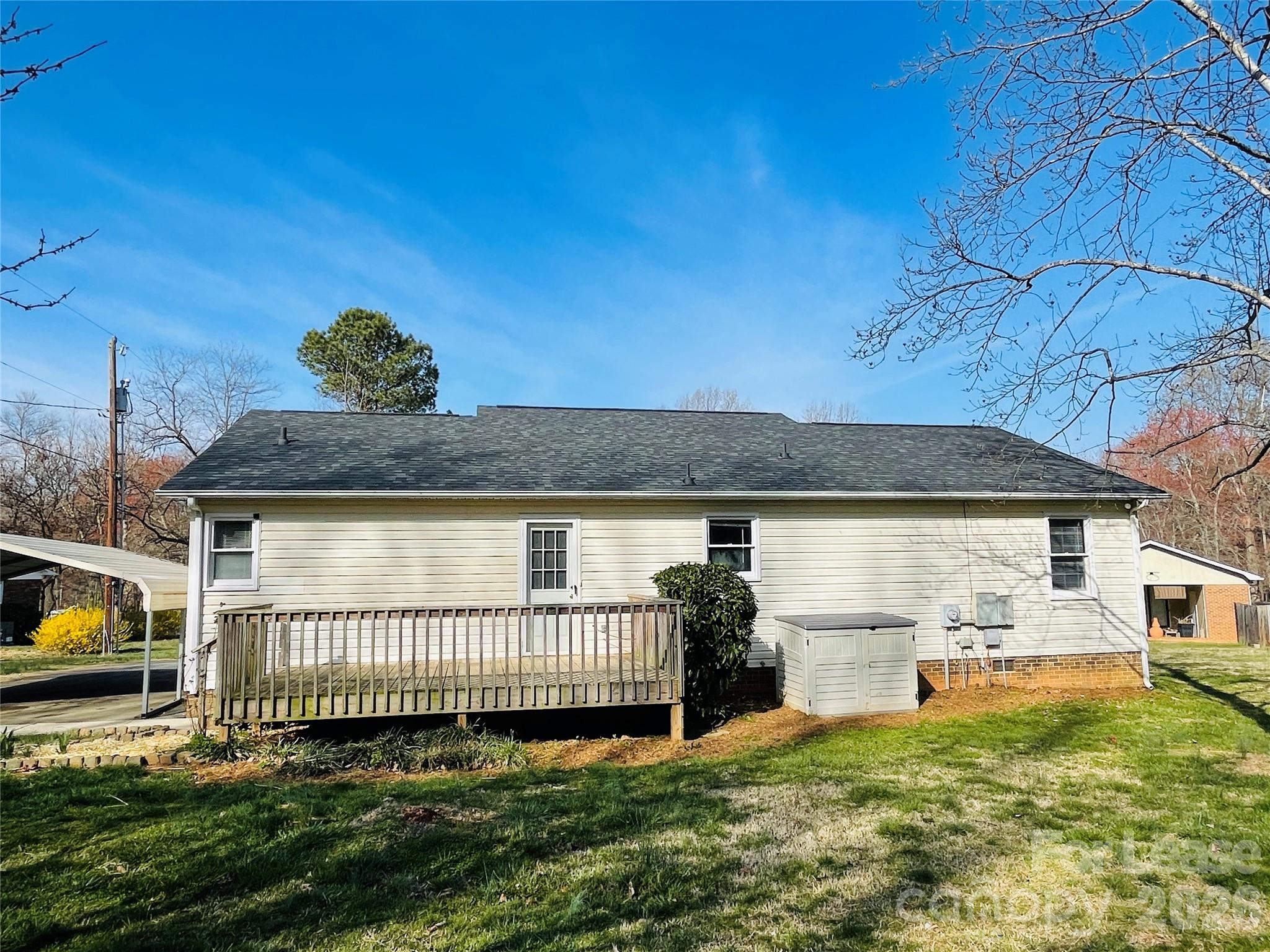 2499 Brookwood Road Lincolnton, NC 28092 - Photo 10 of 12 a view of a house with a yard porch and furniture