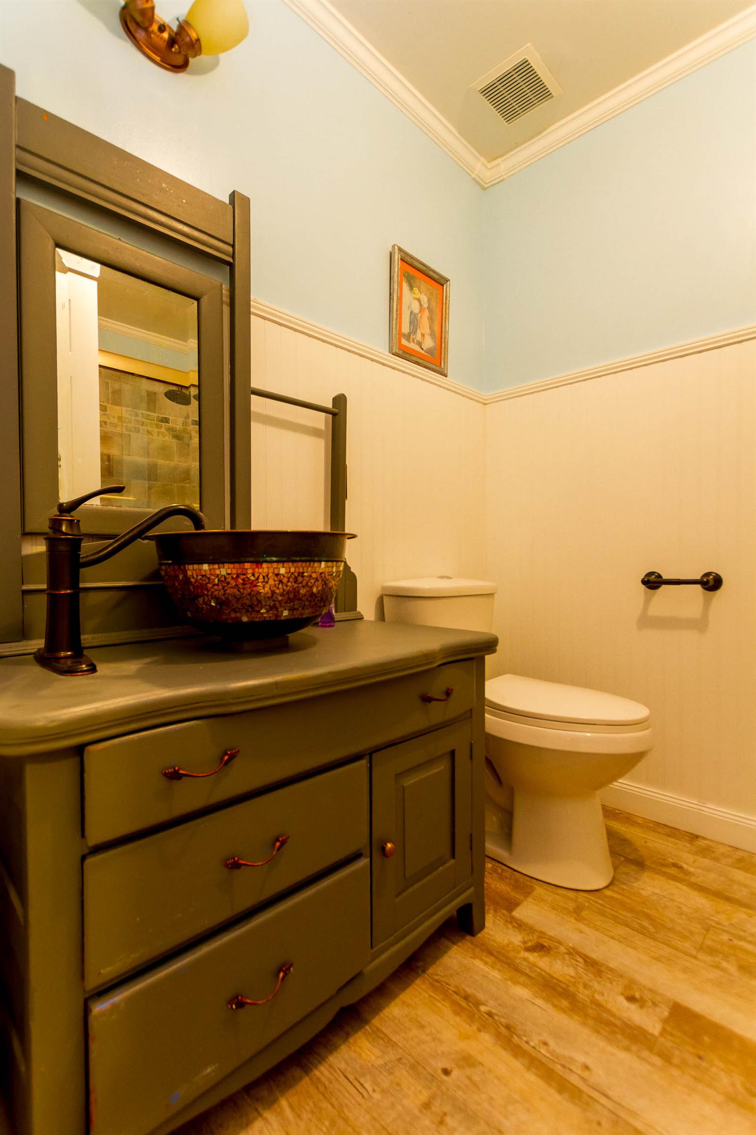 1941 Bradbury Road Adams, TN 37010 - Photo 11 of 30 a bathroom with a toilet sink and mirror