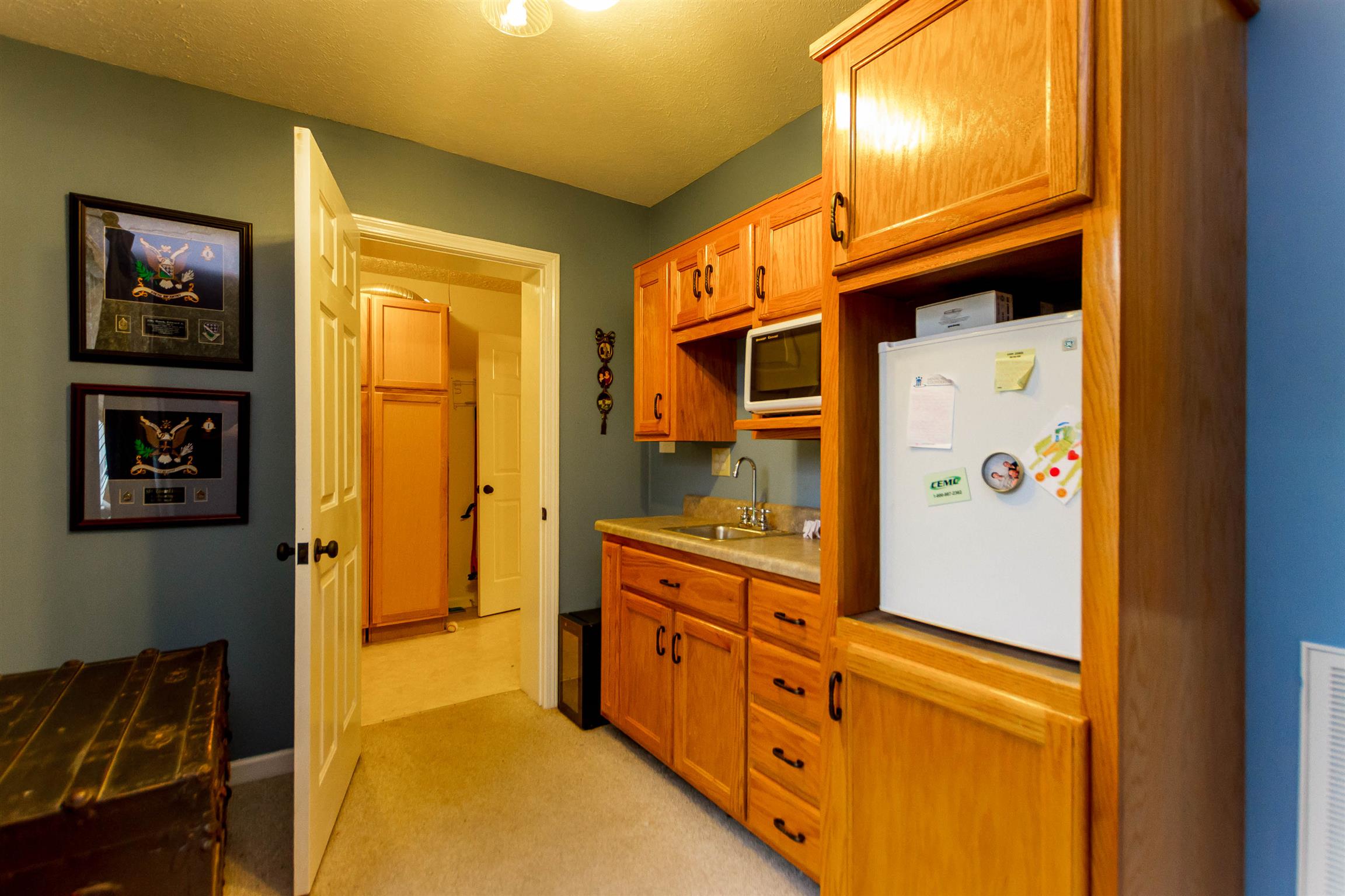 1941 Bradbury Road Adams, TN 37010 - Photo 13 of 30 a kitchen with stainless steel appliances granite countertop a refrigerator and a stove