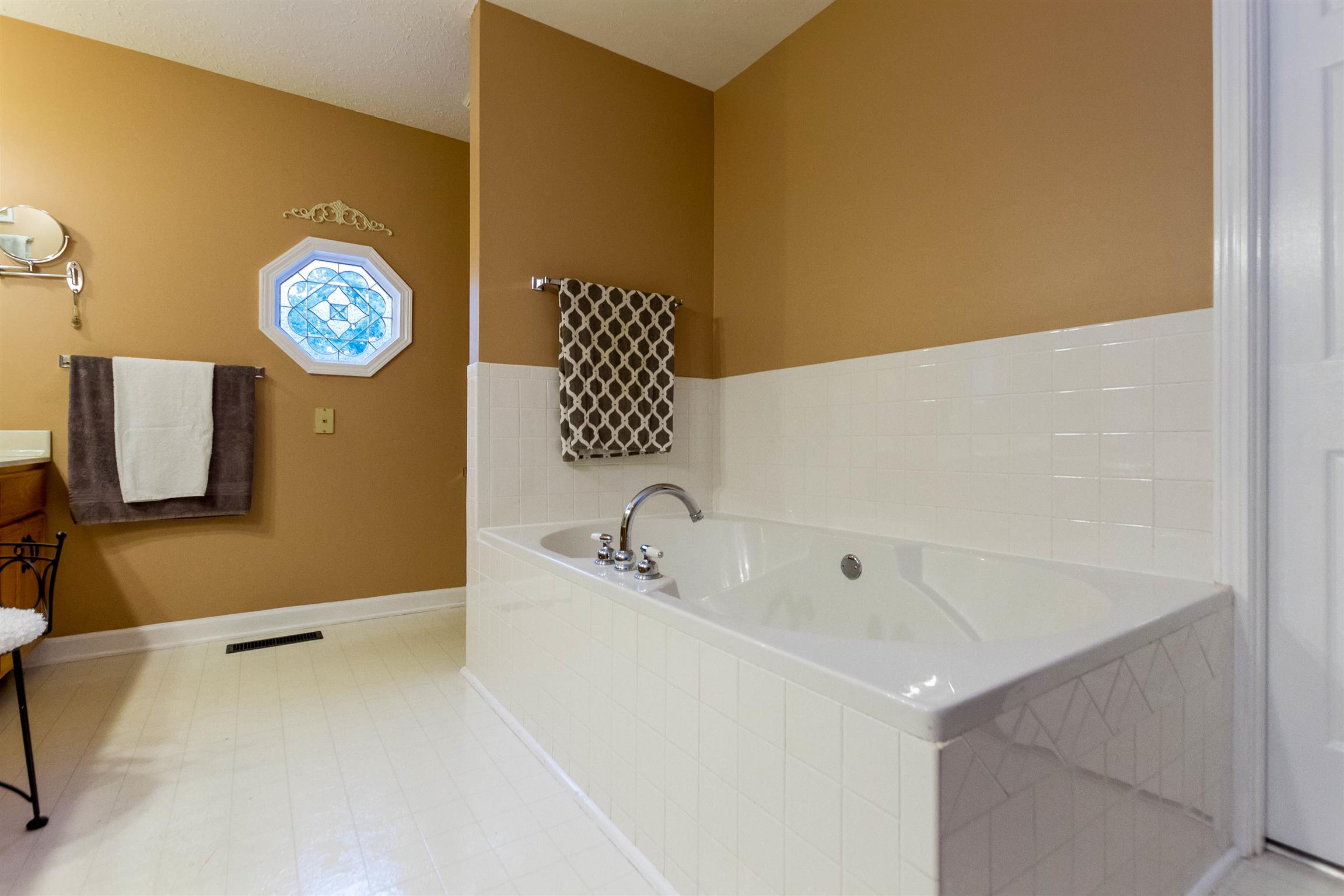 1941 Bradbury Road Adams, TN 37010 - Photo 19 of 30 a bathroom with a sink and a bathtub