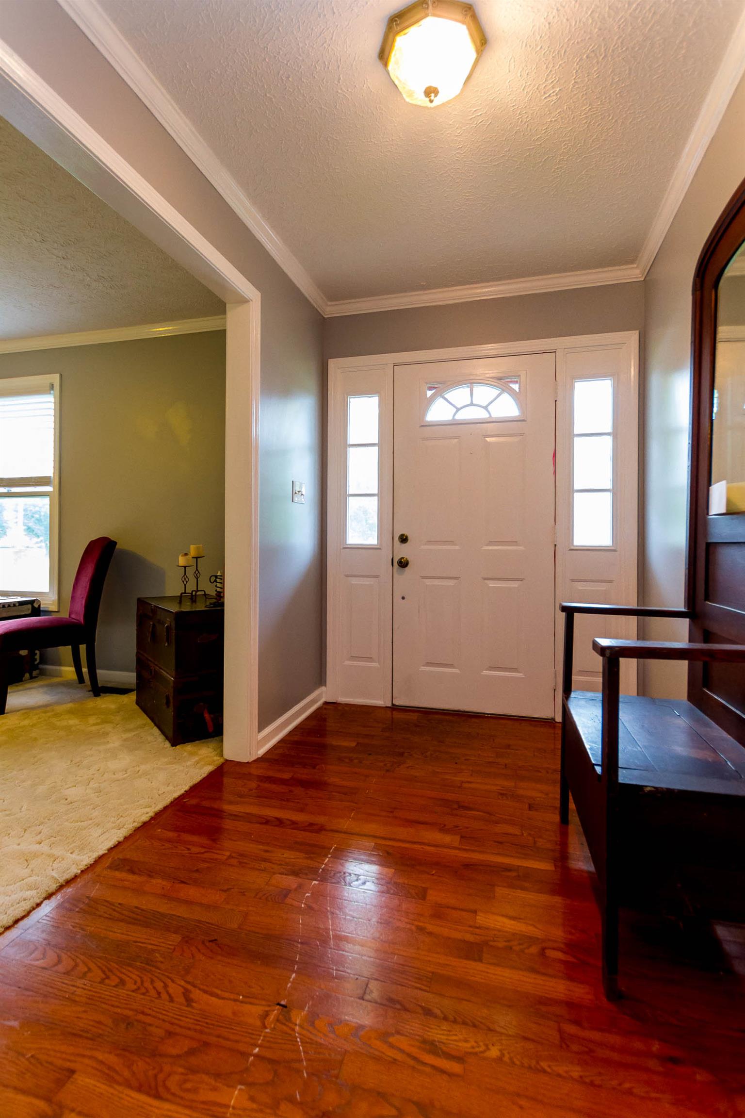 1941 Bradbury Road Adams, TN 37010 - Photo 24 of 30 a view of livingroom with furniture and a workspace