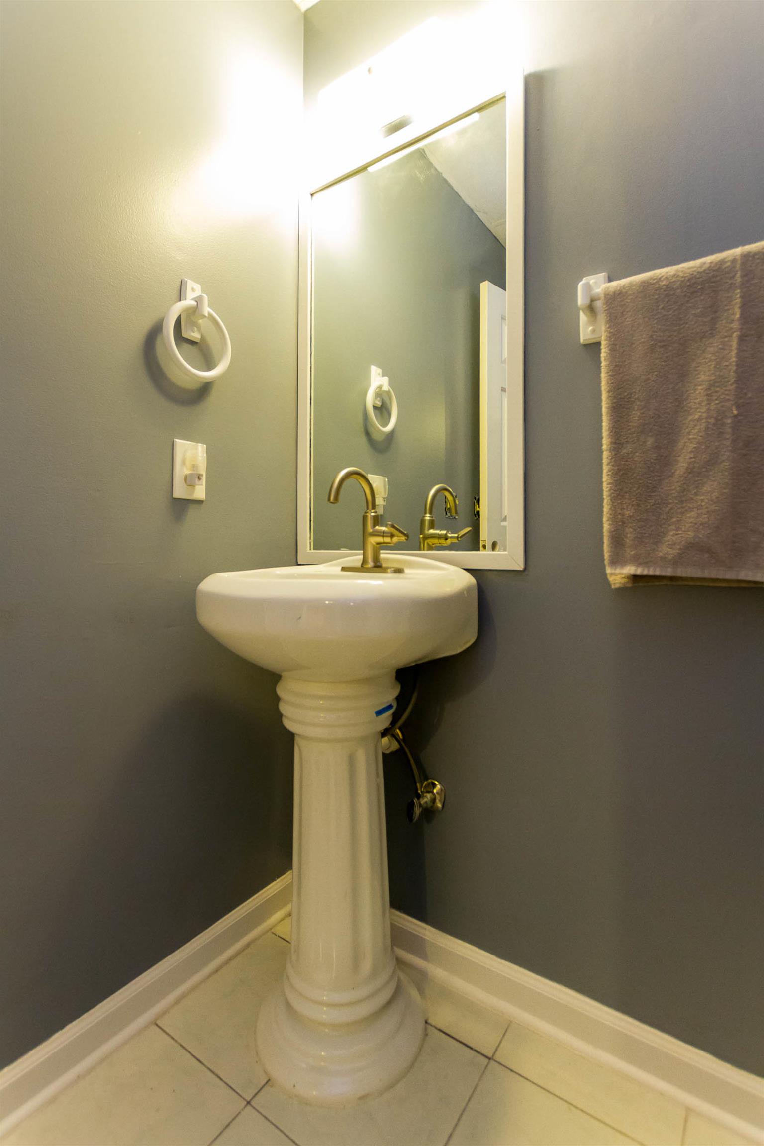 1941 Bradbury Road Adams, TN 37010 - Photo 28 of 30 a bathroom with a sink