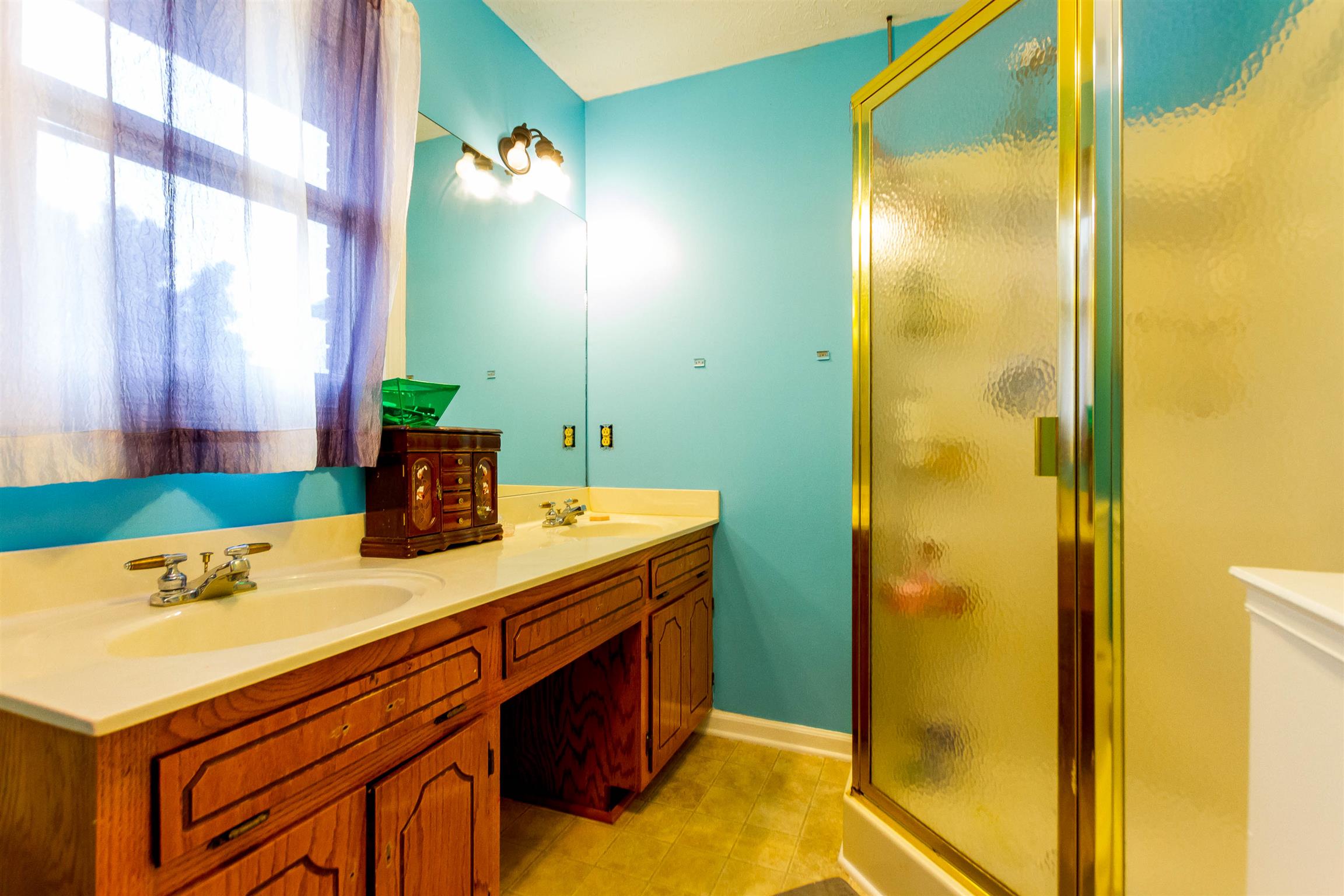 1941 Bradbury Road Adams, TN 37010 - Photo 10 of 30 a bathroom with a sink and a mirror