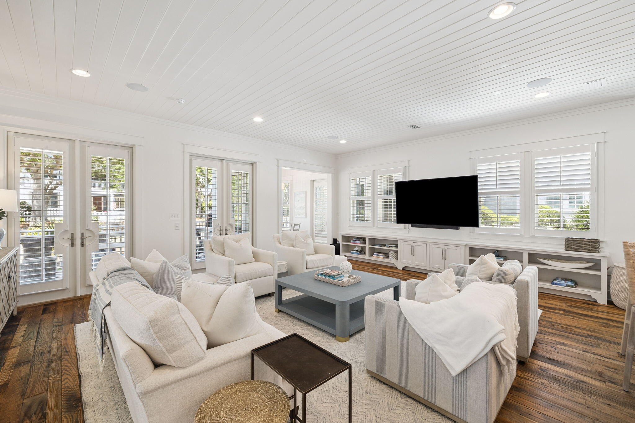 13 Madaket Way Watersound, FL 32461 - Photo 11 of 62 a living room with furniture and a flat screen tv