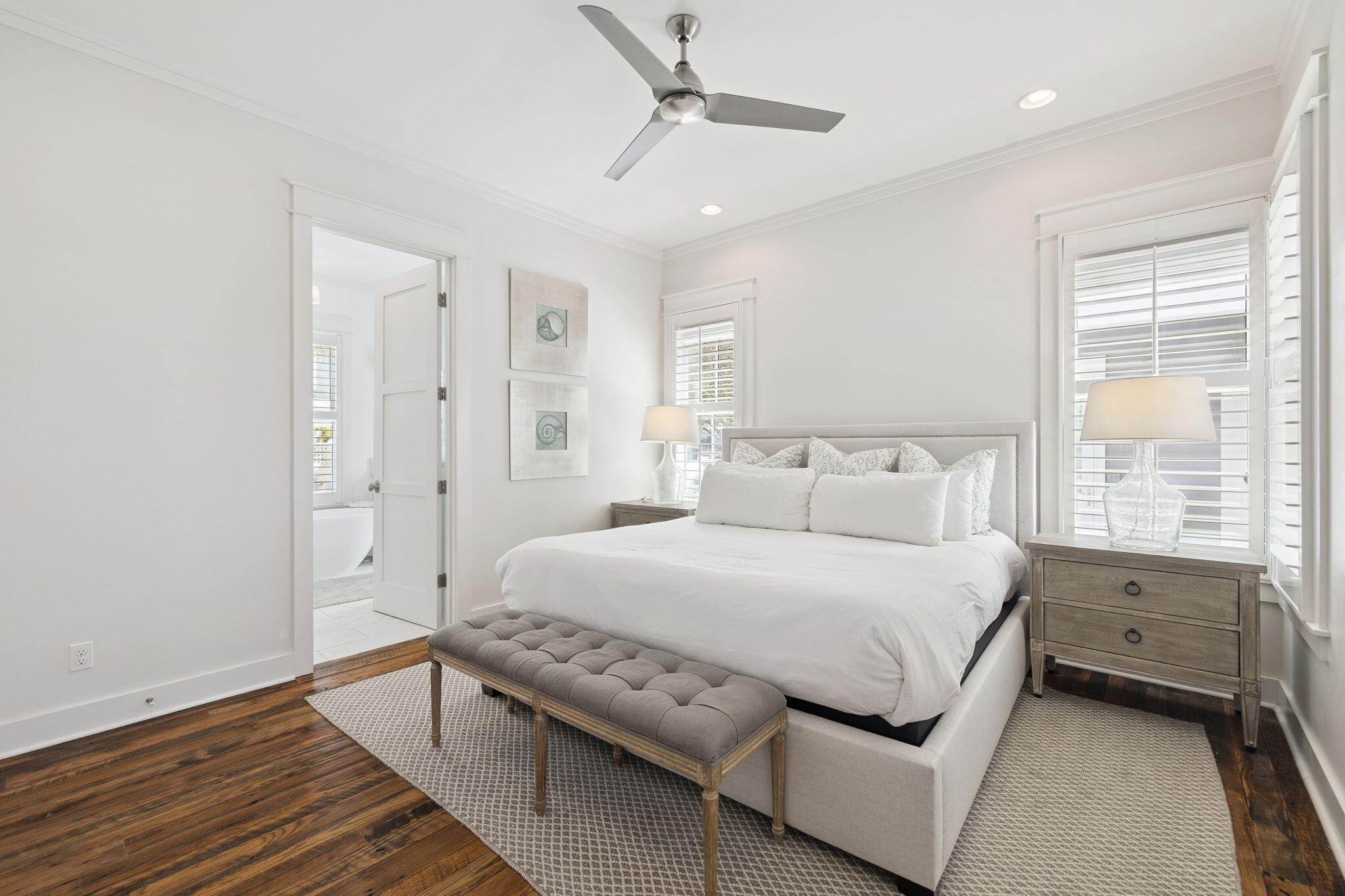 13 Madaket Way Watersound, FL 32461 - Photo 22 of 62 a spacious bedroom with a bed and a window
