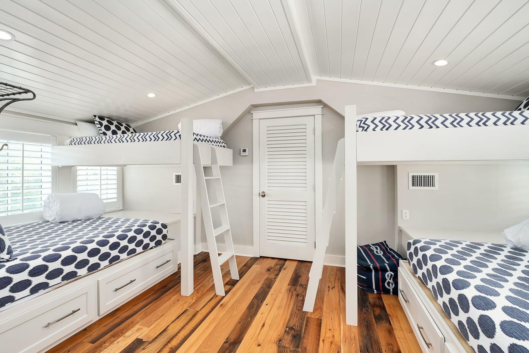 13 Madaket Way Watersound, FL 32461 - Photo 42 of 62 a bedroom with a bed and a window