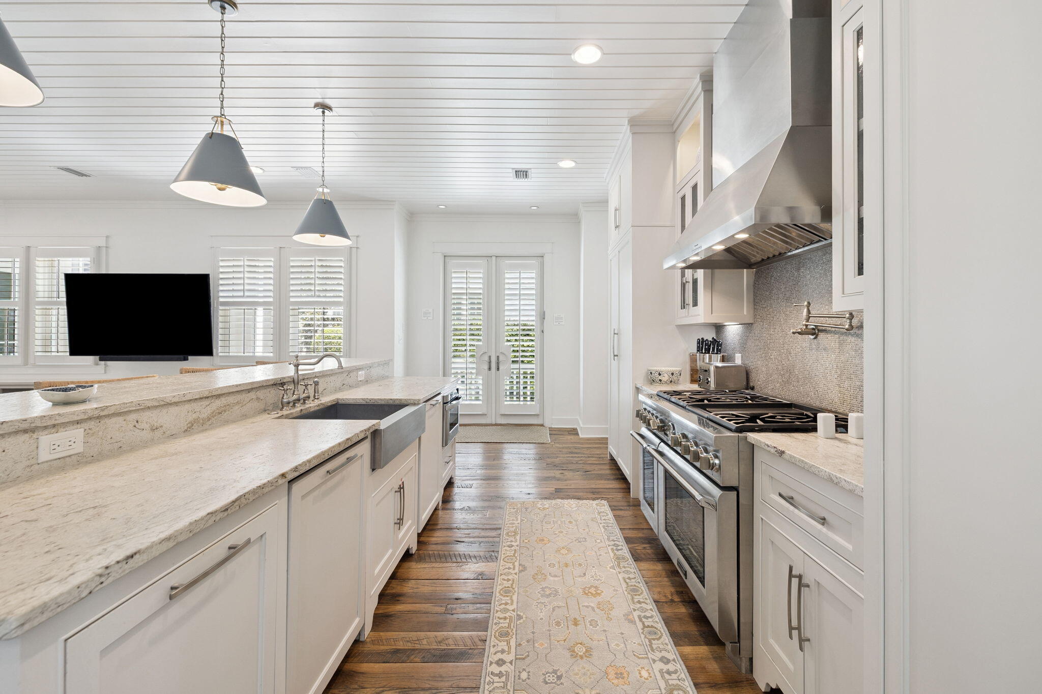 13 Madaket Way Watersound, FL 32461 - Photo 6 of 62 a large kitchen with a stove and a sink