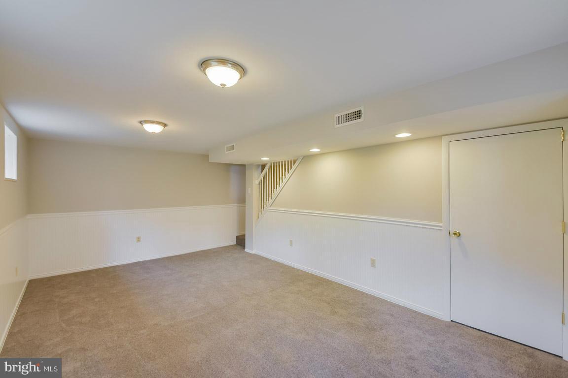 6716 Huntsman Boulevard Springfield, VA 22152 - Photo 22 of 30 a view of an empty room