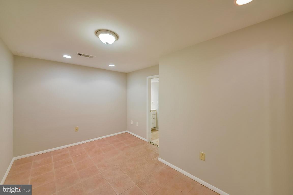 6716 Huntsman Boulevard Springfield, VA 22152 - Photo 23 of 30 a view of an empty room