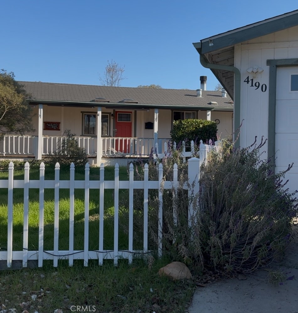 4190 Hackney Way Paso Robles, CA 93446 - Photo 2 of 40 a front view of a house with glass windows and plants