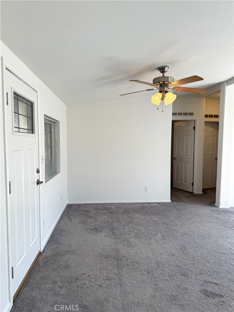 4190 Hackney Way Paso Robles, CA 93446 - Photo 7 of 40 a view of an empty room with a window