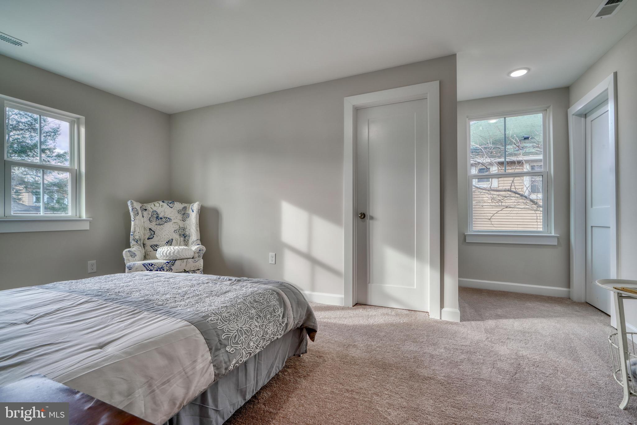 231 Mallow Hill Road Baltimore, MD 21229 - Photo 23 of 48 a bedroom with a bed and a window
