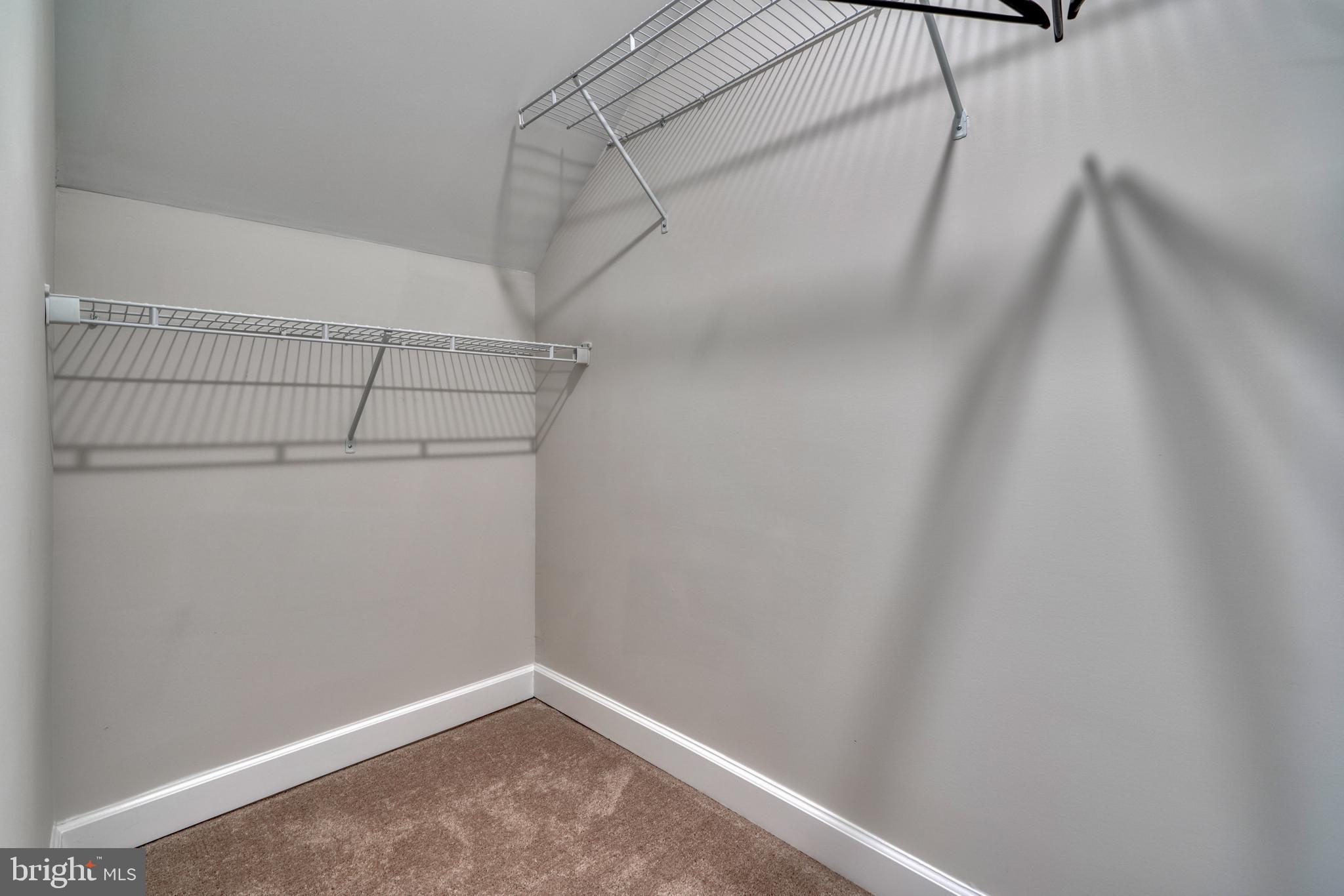 231 Mallow Hill Road Baltimore, MD 21229 - Photo 25 of 48 a view of a room with racks on the wall