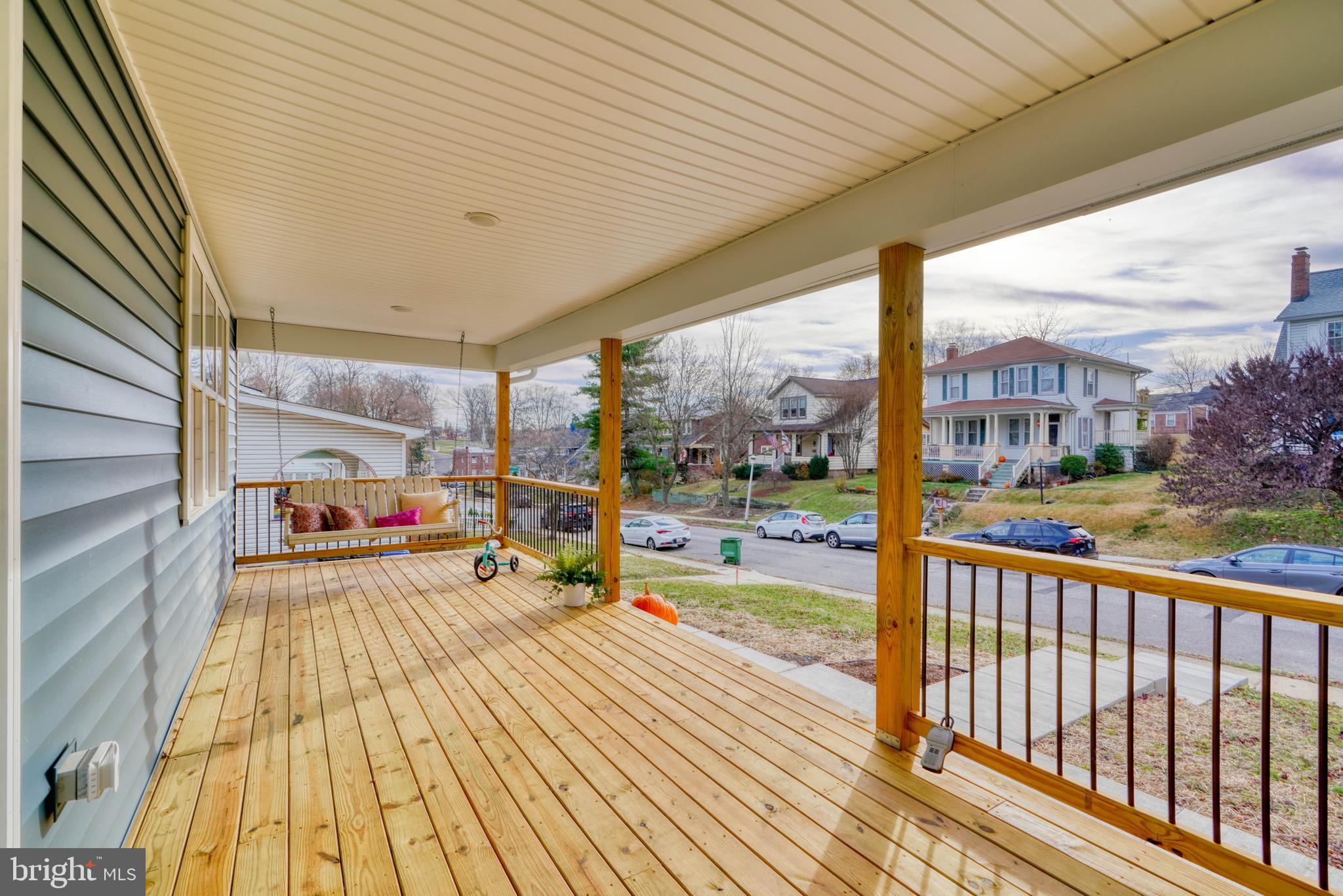 231 Mallow Hill Road Baltimore, MD 21229 - Photo 4 of 48 a view of a balcony with wooden floor