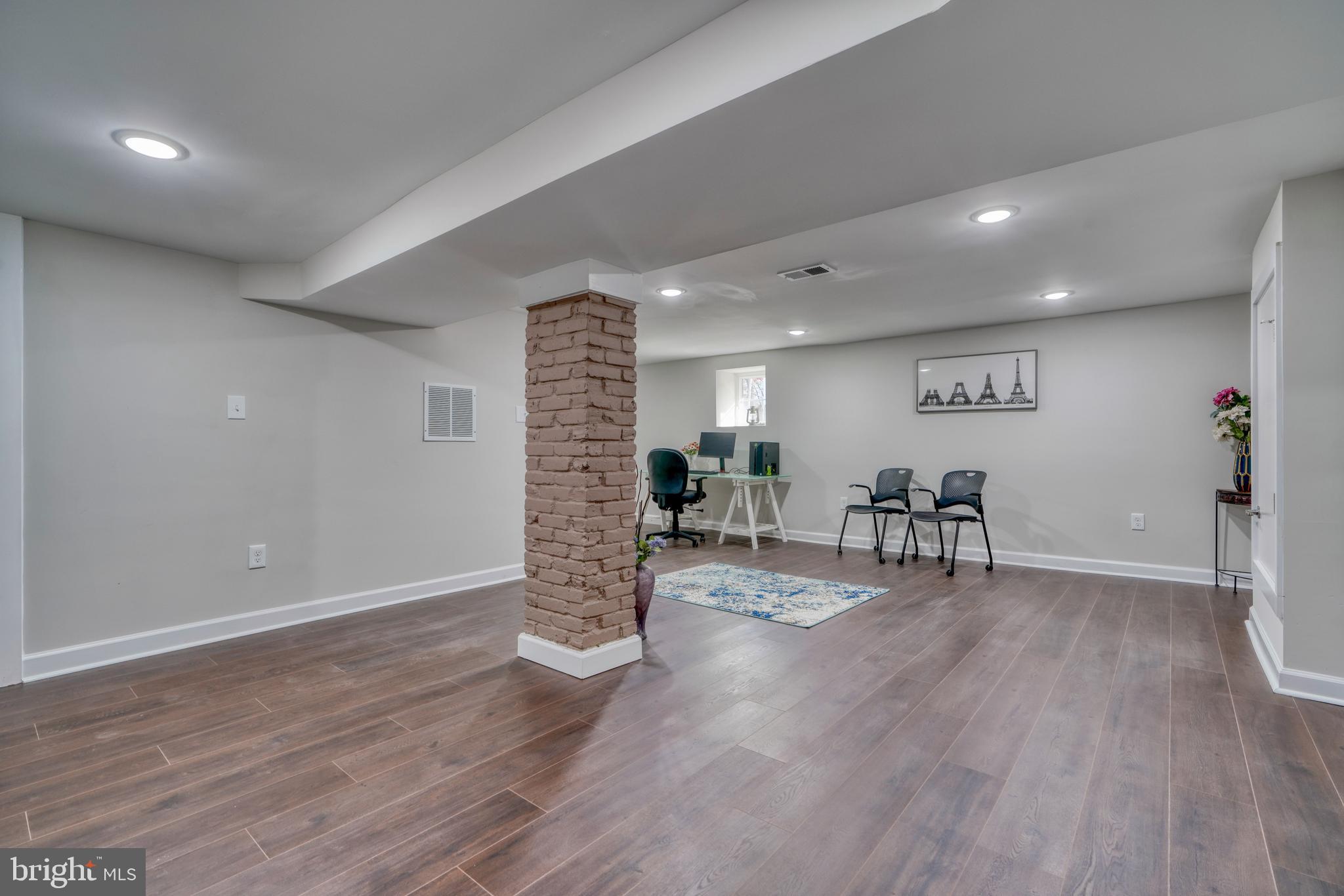 231 Mallow Hill Road Baltimore, MD 21229 - Photo 42 of 48 a view of a room with furniture and wooden floor