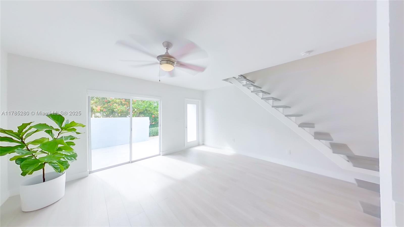 798 Crandon Boulevard, Unit 45B Key Biscayne, FL 33149 - Photo 4 of 22 a view of an empty room with a window