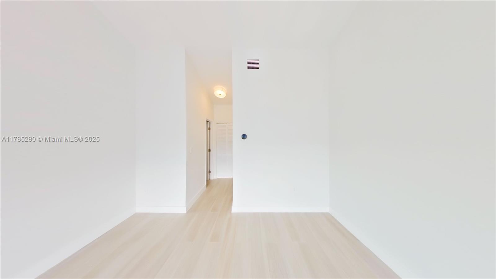 798 Crandon Boulevard, Unit 45B Key Biscayne, FL 33149 - Photo 10 of 22 a view of an empty room