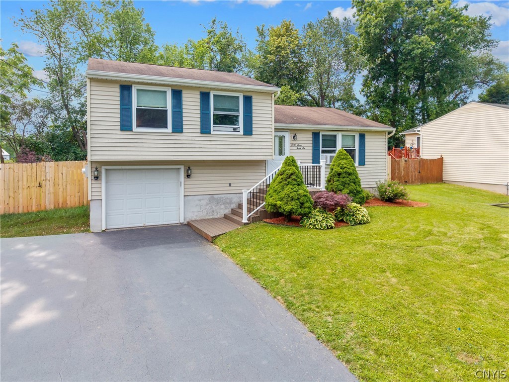 4346 Old Meadow Road Clay, NY 13041 - Photo 2 of 33 The double-wide driveway has space for numerous ca