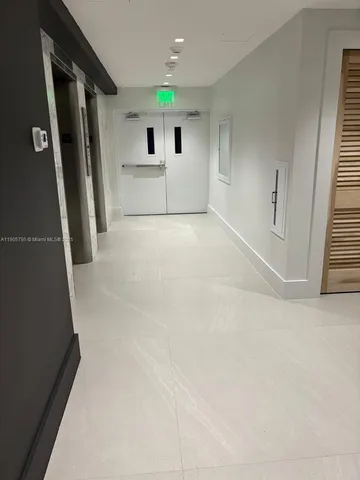 en empty room with windows