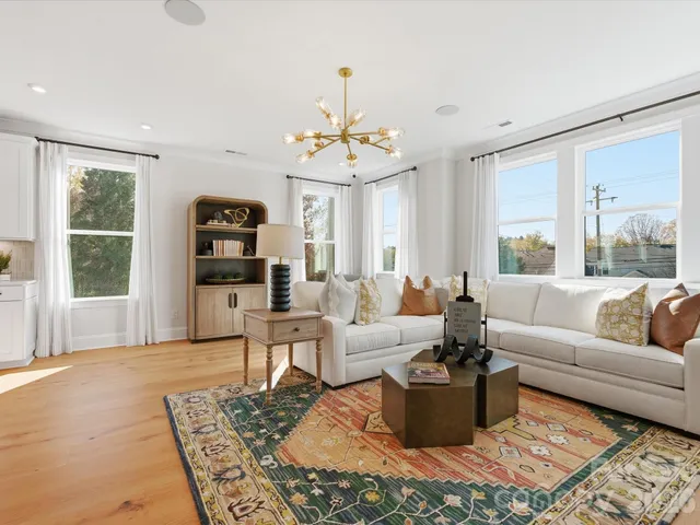 a living room with furniture or window and a table