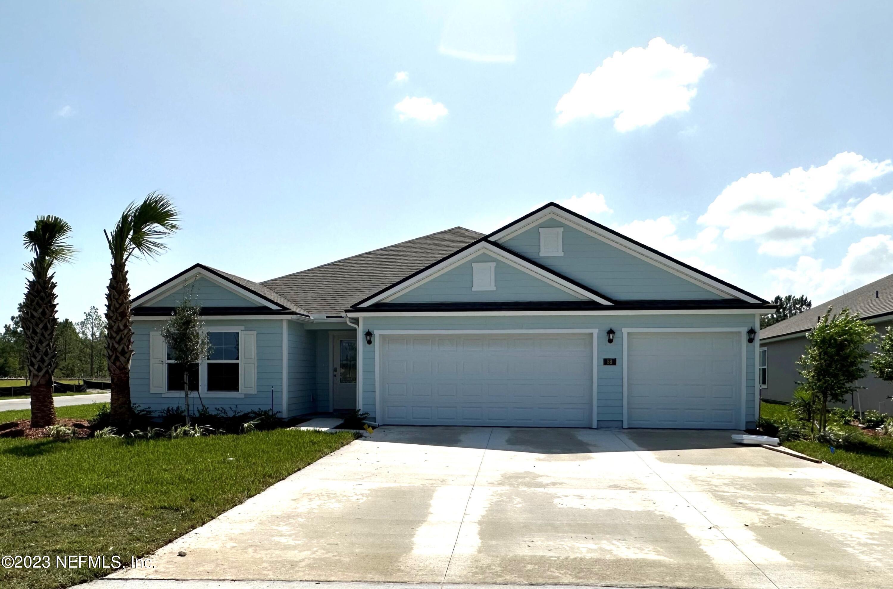 58 Hulett Wds Road Palm Coast, FL 32137 - Photo 1 of 36 Front complete