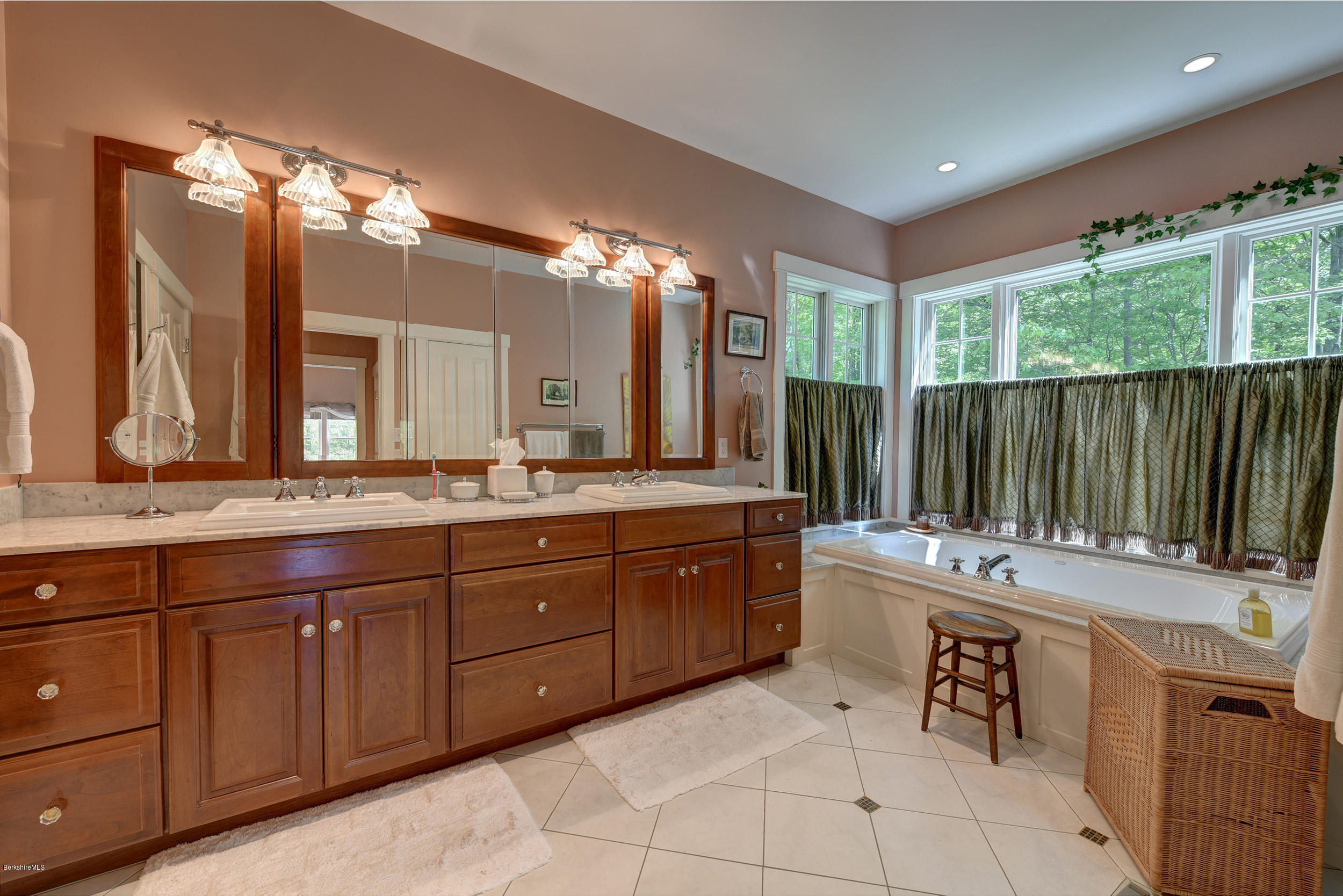 28 Austerlitz Road West Stockbridge, MA 01266 - Photo 16 of 44 a spacious bathroom with a granite countertop sink and a mirror
