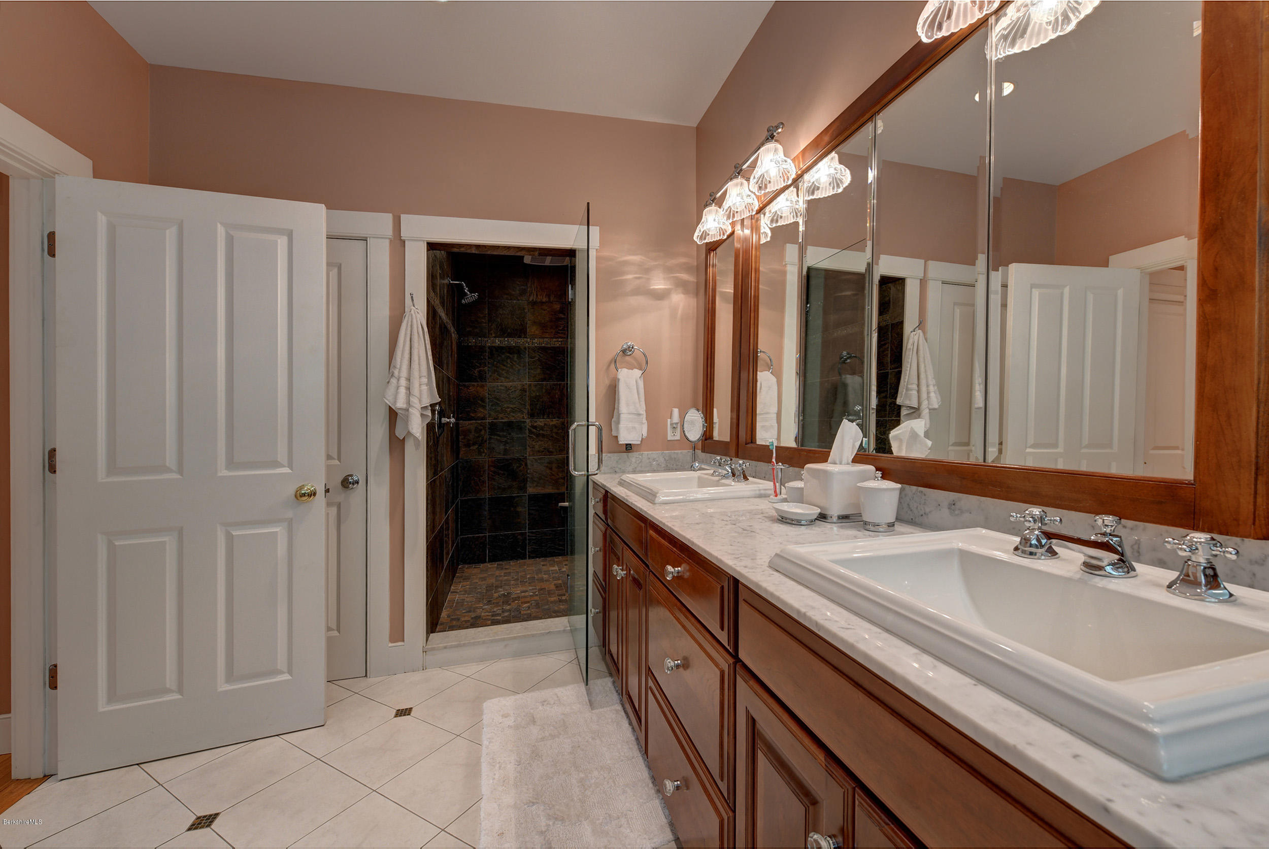 28 Austerlitz Road West Stockbridge, MA 01266 - Photo 17 of 44 a spacious bathroom with a double vanity sink and a mirror