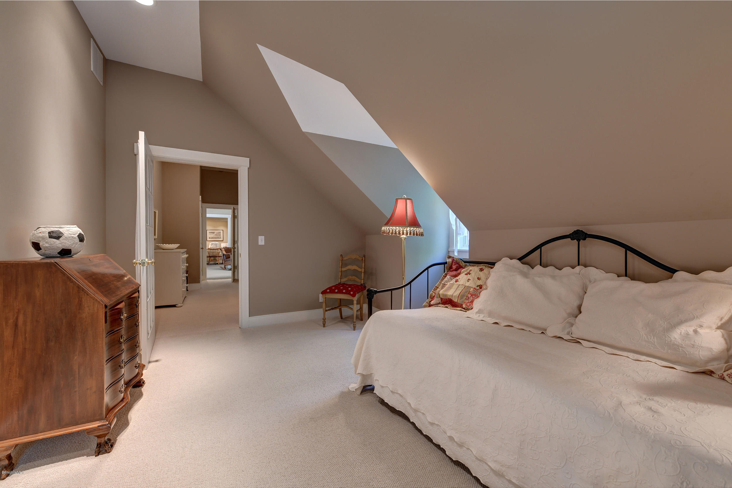 28 Austerlitz Road West Stockbridge, MA 01266 - Photo 23 of 44 a bedroom with bed and a chandelier