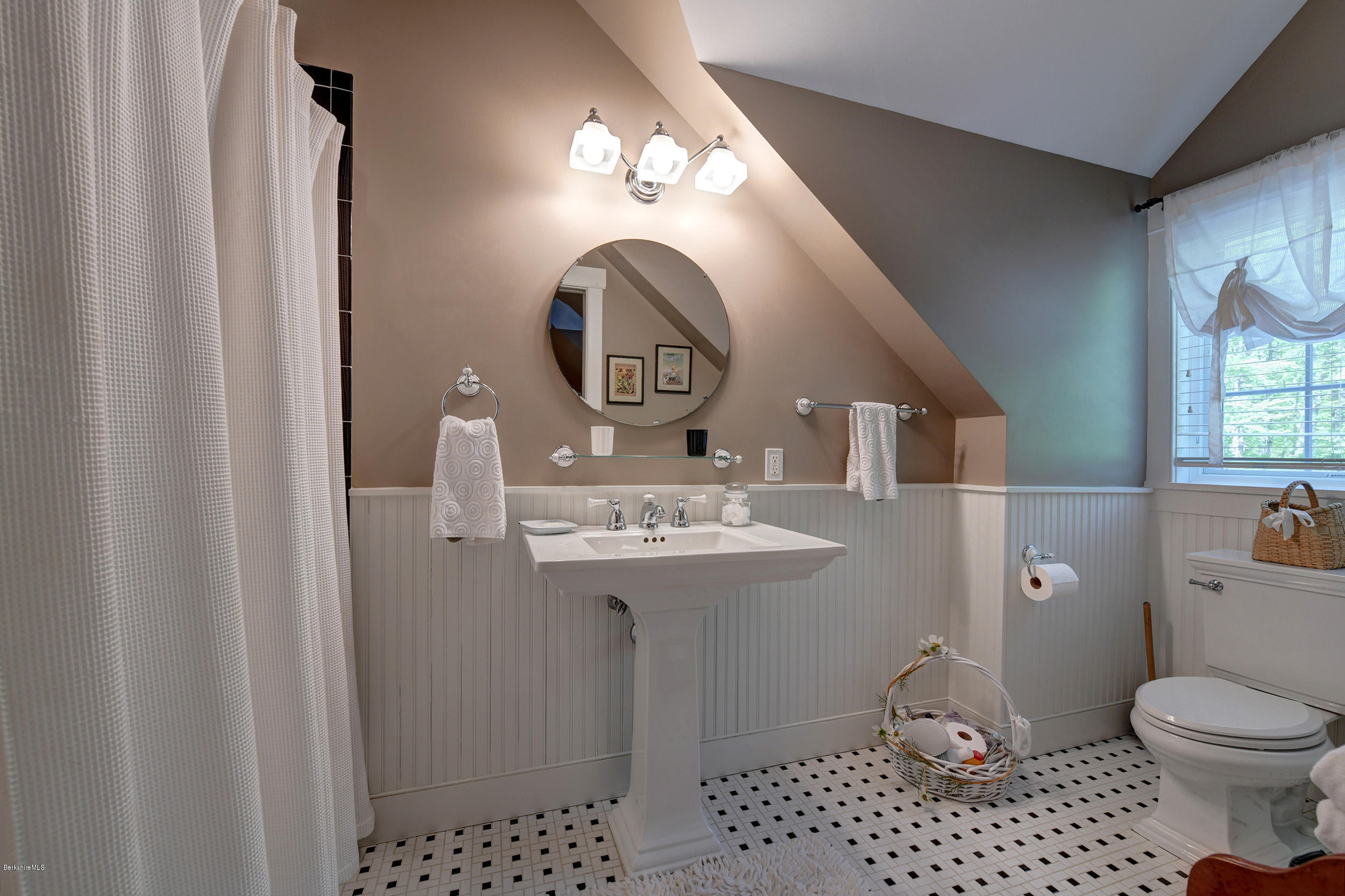 28 Austerlitz Road West Stockbridge, MA 01266 - Photo 27 of 44 a bathroom with a toilet a sink and mirror