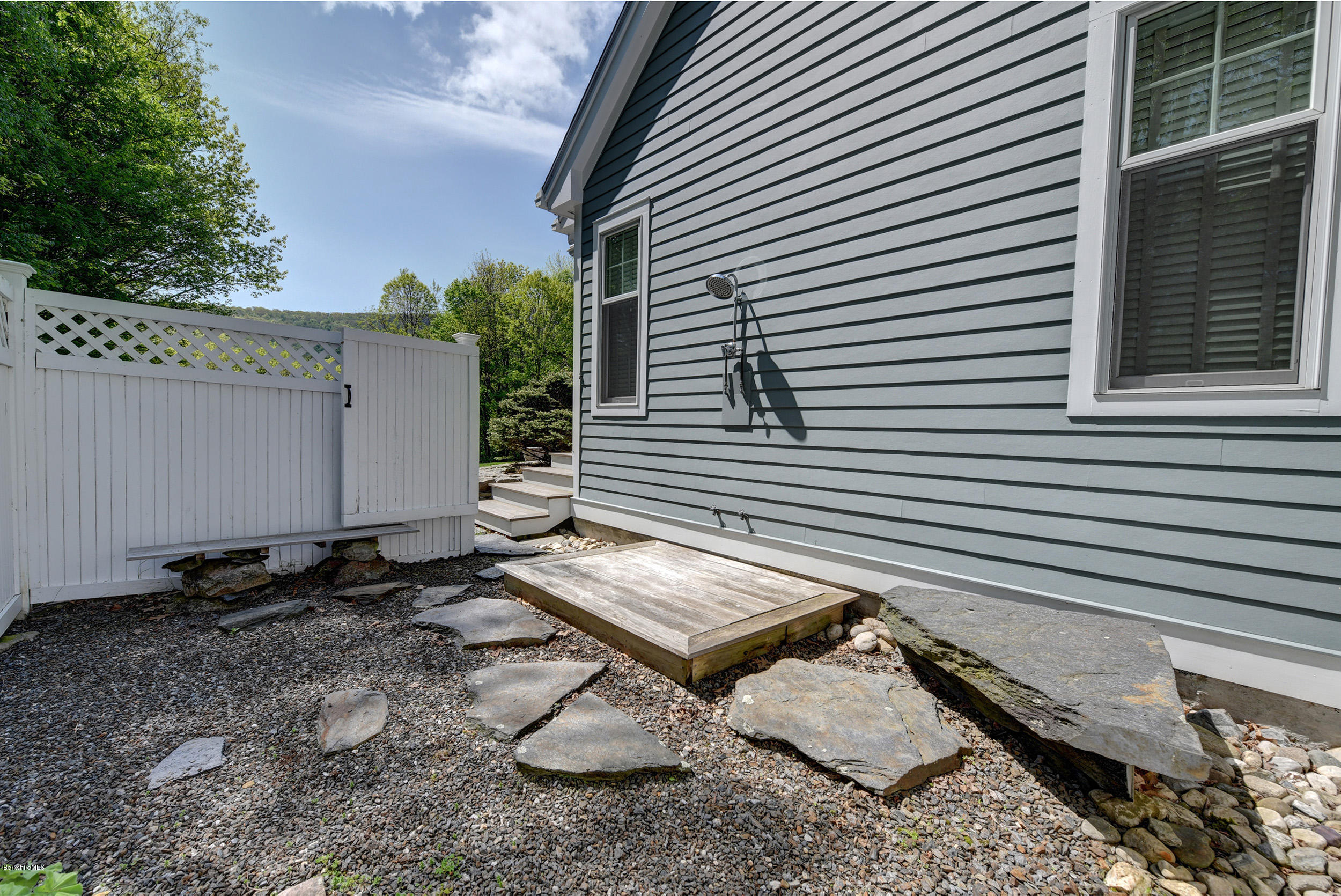 28 Austerlitz Road West Stockbridge, MA 01266 - Photo 36 of 44 a view of a small house with a yard